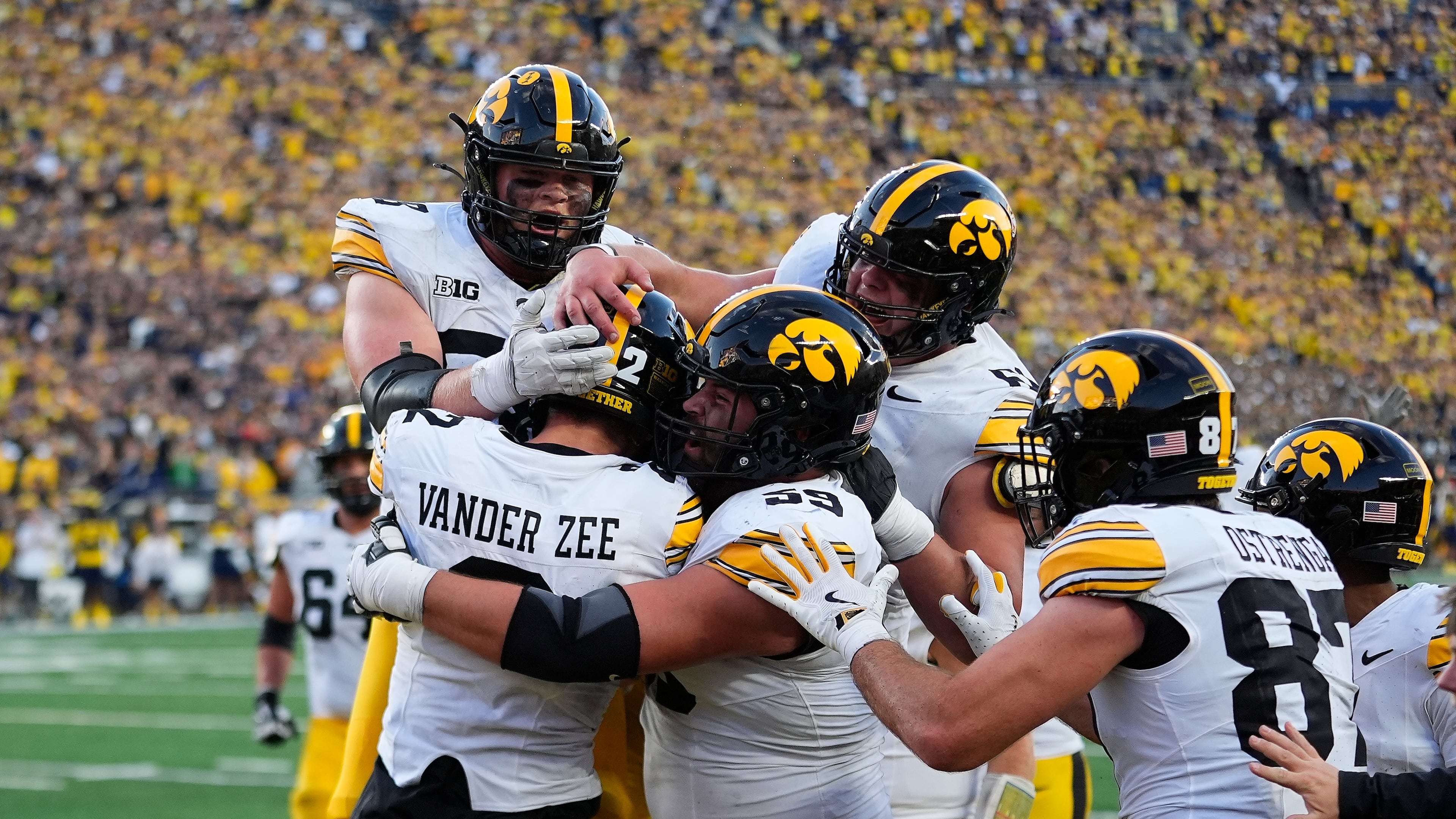 Iowa wide receiver Reece Vander Zee (2) celebrates his 16-yard touchdown reception against Michigan during the second half of an NCAA college football game in Ann Arbor, Mich., Saturday, Sept. 26, 2026. (AP Photo/Paul Sancya)