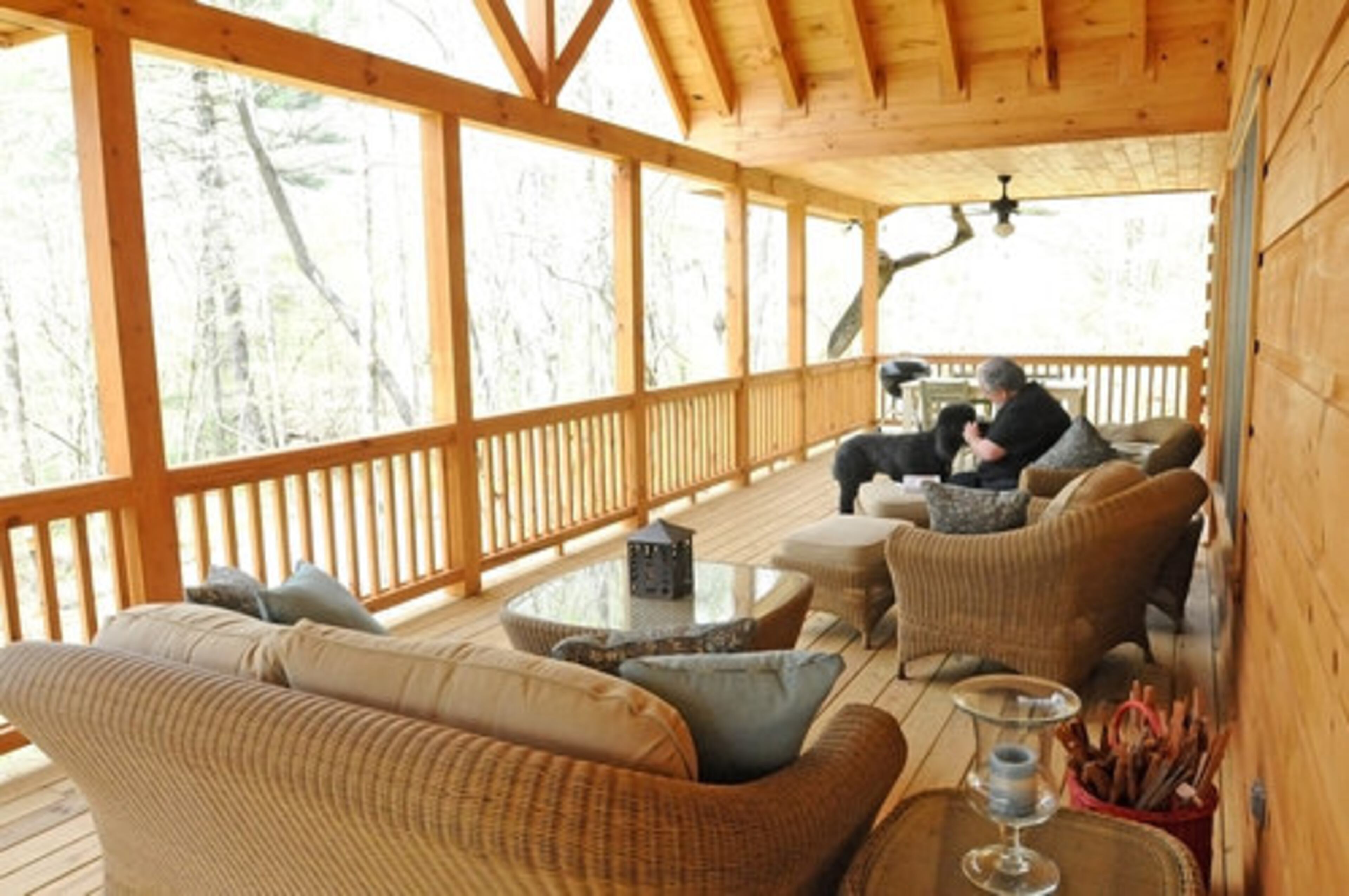 The couple spends most of its time on two covered porches, including a 12 foot-by-48 foot one facing the creek. "You get out there on that porch and it's so quiet," Del said. "It's just that background white noise of the creek. It's just so relaxing. You don't have to do anything. You just sort of sit there and watch birds flitter around and sit there."