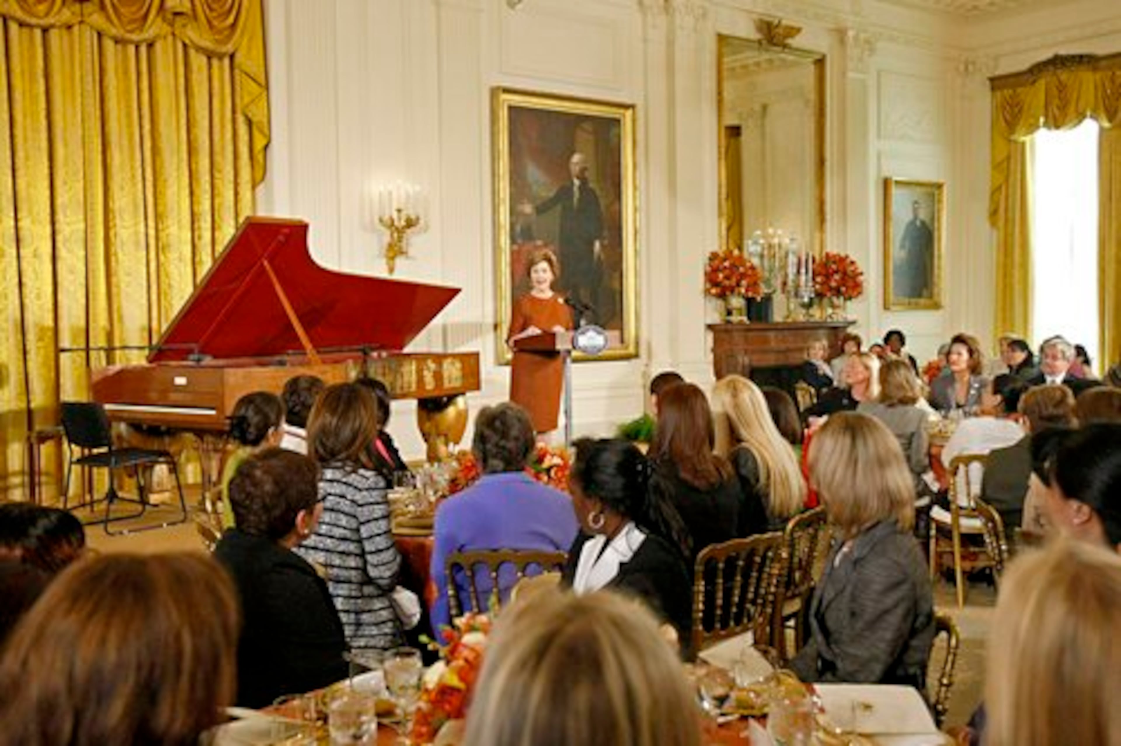 First lady Laura Bush delivers remarks at a luncheon to honor spouses of the Diplomatic Corps, on Monday, in the East Room of the White House in Washington D.C.