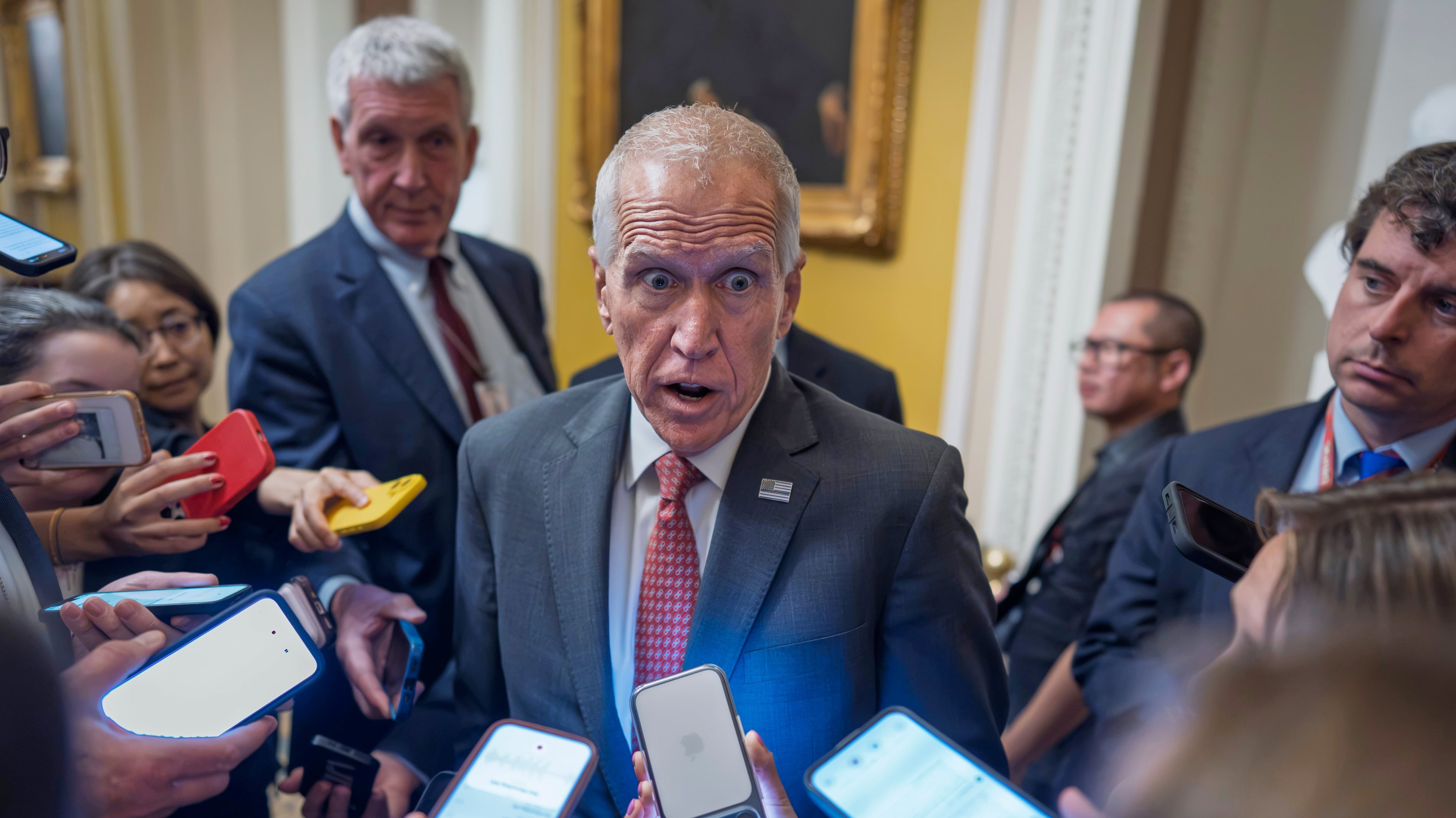 Sen. Thom Tillis, R-N.C., speaks to reporters as Republican senators arrive for a closed-door lunch at the Capitol in Washington, Tuesday, June 23, 2026, to prepare for a meeting with President Donald Trump Wednesday. (AP Photo/J. Scott Applewhite)