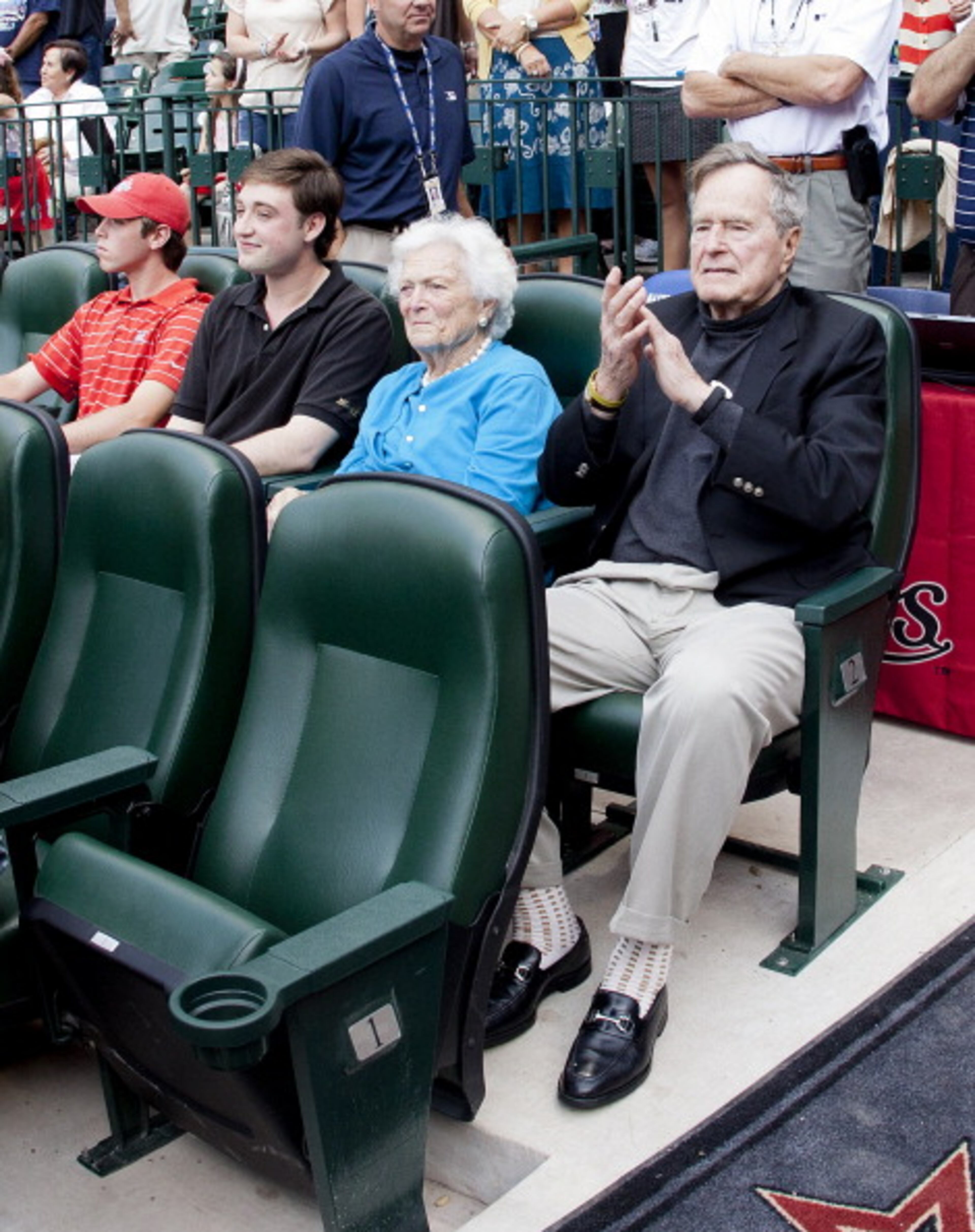 HOUSTON - APRIL 06: Former President George H.W. Bush and wife Barbara watch the game between the Colorado Rockies and the Houston Astros on Opening Day at Minute Maid Park on April 6, 2012 in Houston, Texas. (Photo by Bob Levey/Getty Images)