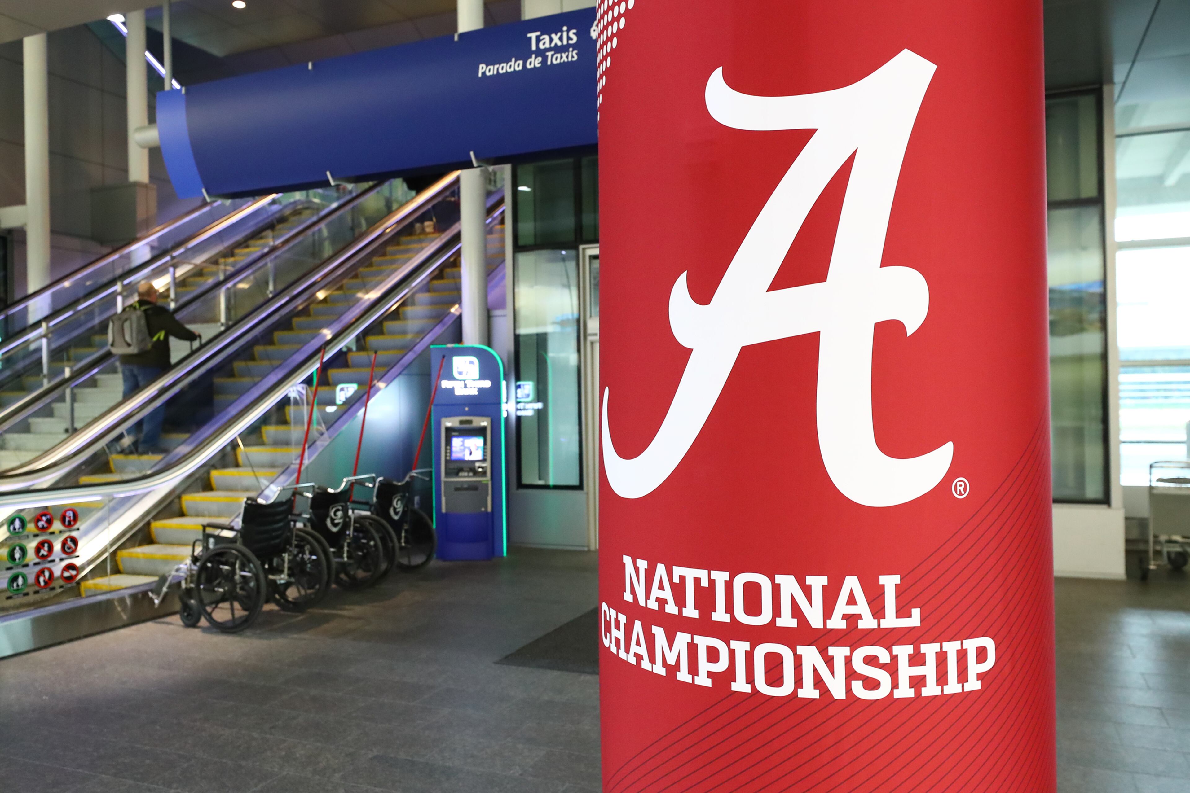 010622 Indianapolis: A Alabama National Championship sign welcomes football fans for the big game at the Indianopolis International Airport on Thursday, Jan. 6, 2022, in Indianapolis. “Curtis Compton / Curtis.Compton@ajc.com”`