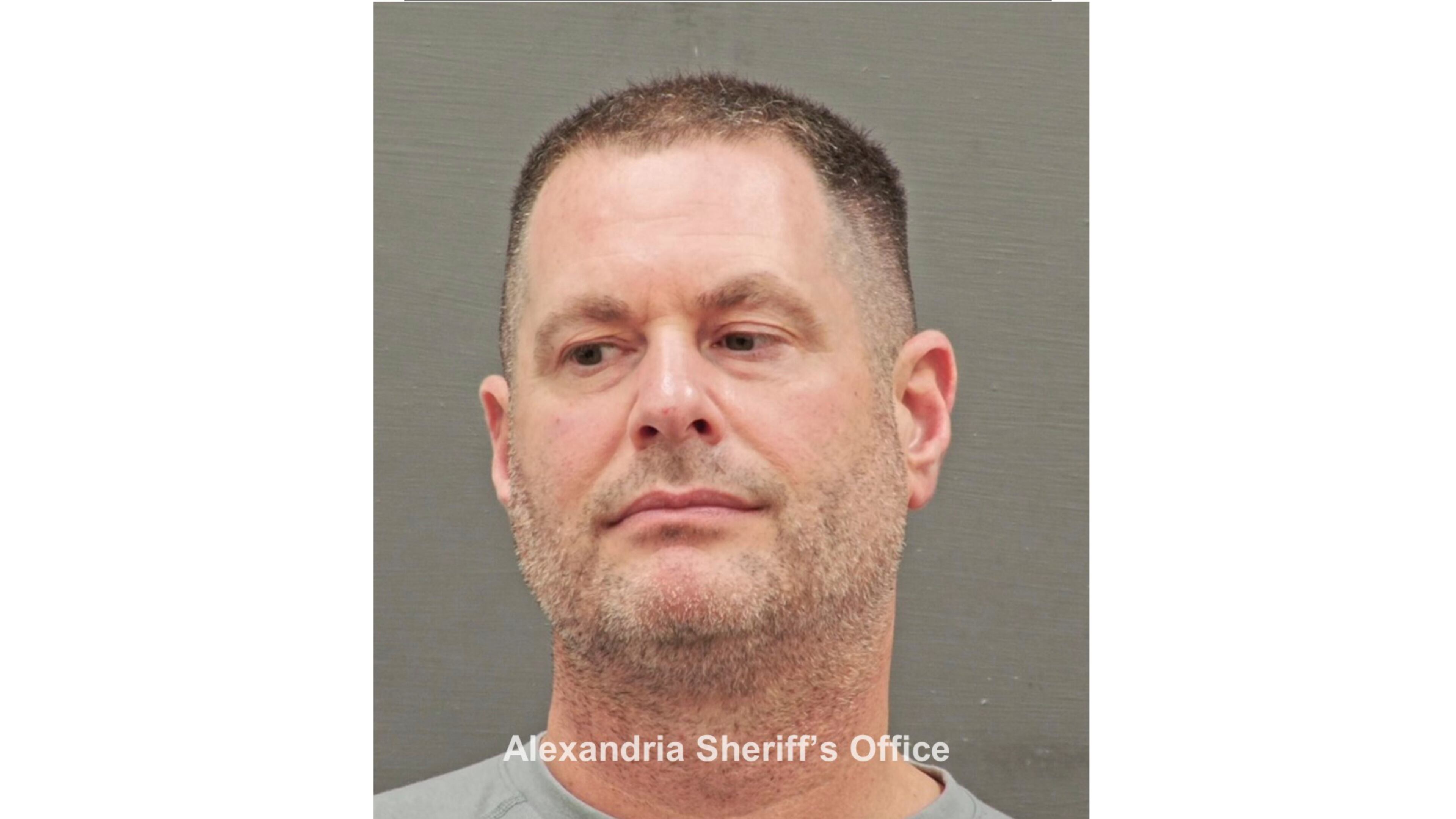 In this image provided and annotated by the Alexandria's Sheriff's Office, David J. Rush is seen in his booking photo in Alexandria, Va. (Alexandria Sheriff via AP)