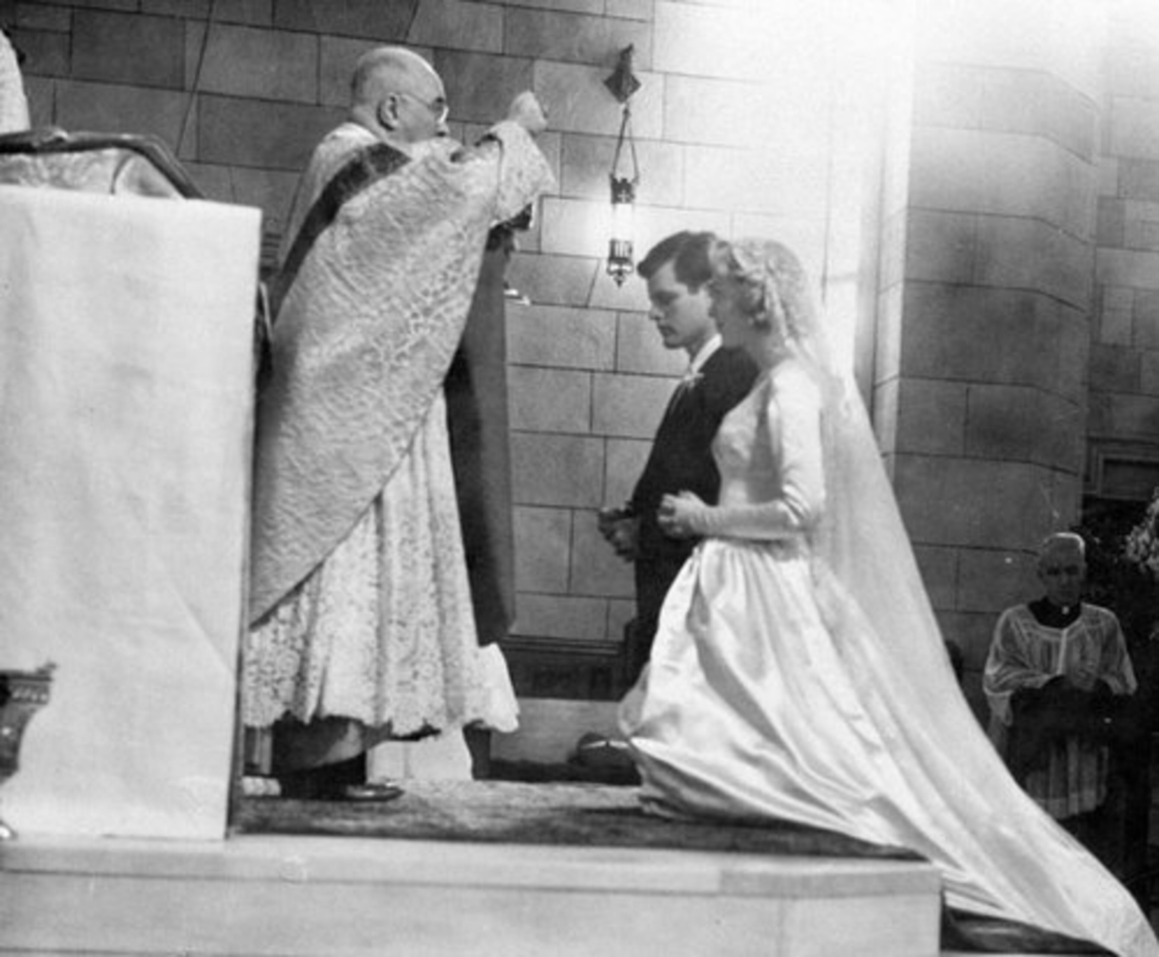On Nov. 11, 1958, Edward M. Kennedy, and Joan Bennett, kneel on altar and receive communion from Francis Cardinal Spellman, Archbishop of New York at the nuptial mass at St. Joesph's Roman Catholic Church in Bronxville, N.Y.