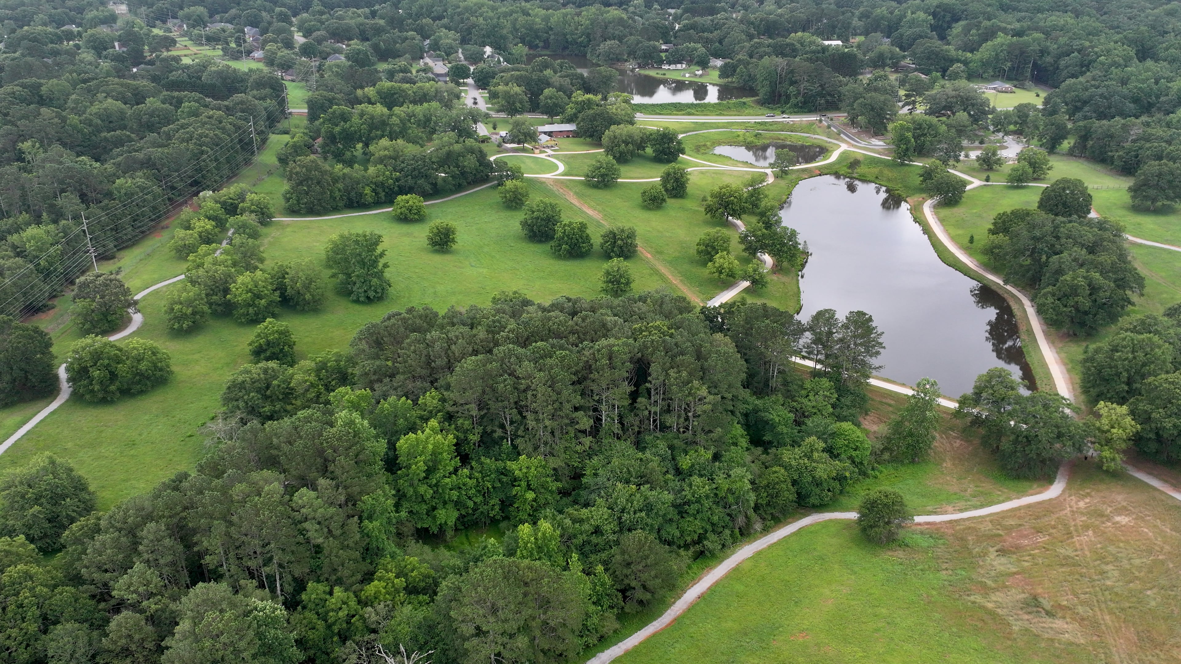 The city of Watkinsville in Oconee County recently purchased the land that is now called the Thomas Farm Preserve, a 98-acre farm with open pasture, woodlands, two ponds and frontage along Calls Creek. (Hyosub Shin/AJC)