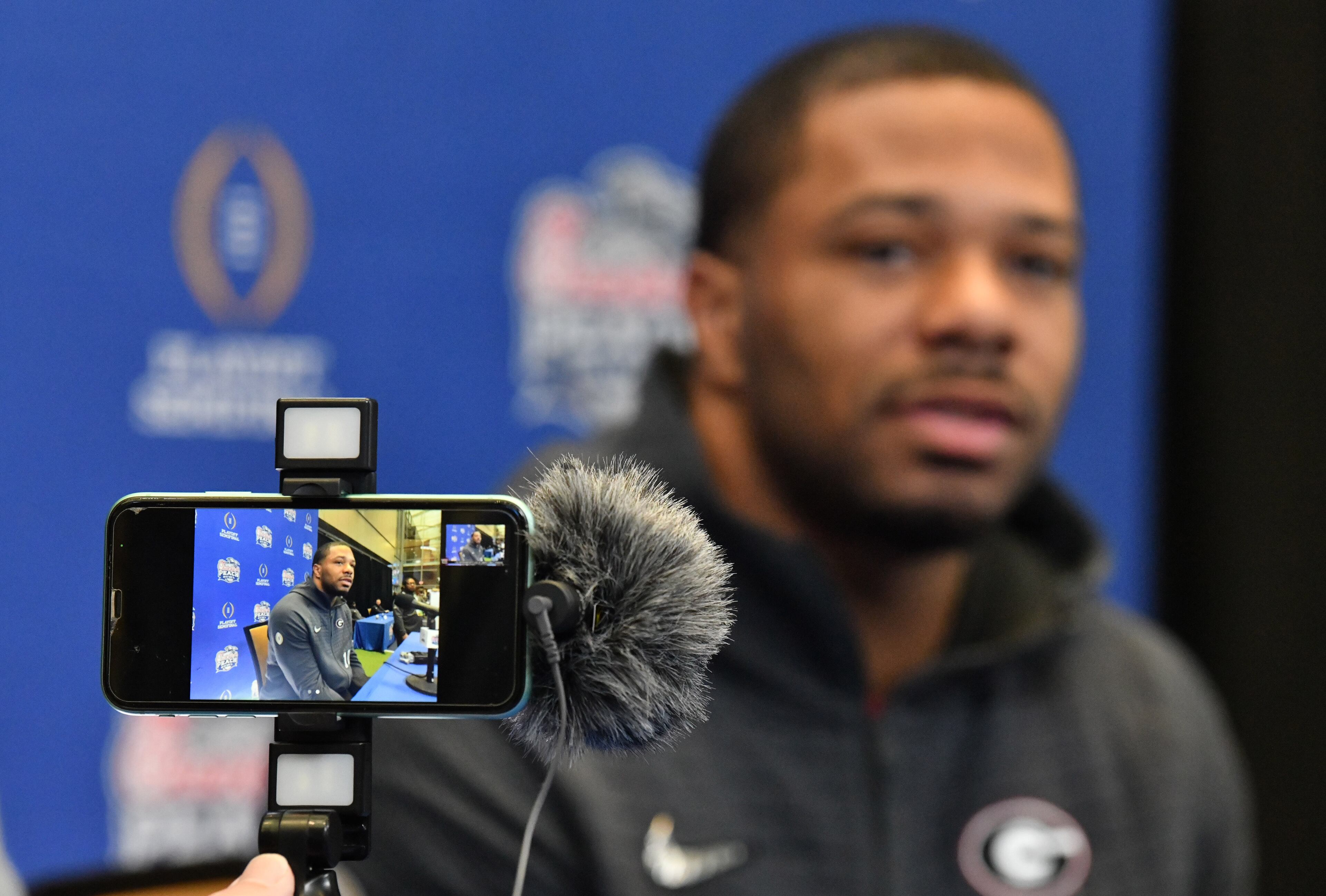 Georgia linebacker Jamon Dumas-Johnson speaks during Peach Bowl Media Day on Thursday at the College Football Hall of Fame in Atlanta. (Hyosub Shin / Hyosub.Shin@ajc.com)
