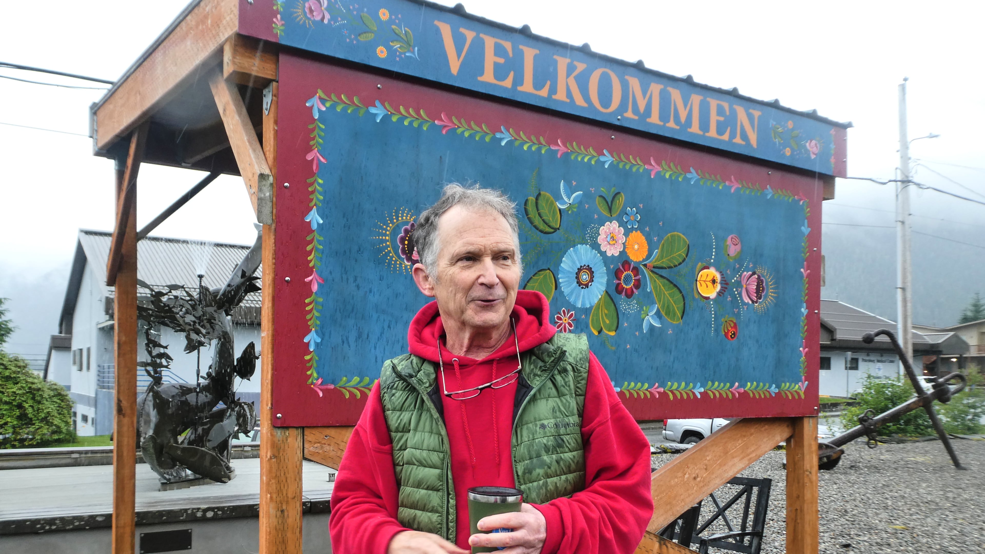 FILE - Dan Sullivan, a candidate in Alaska's U.S. Senate race who shares a name with the incumbent seeking reelection, talks in front of a welcome sign near downtown Petersburg, Alaska, July 3, 2026. (AP Photo/Becky Bohrer, File)