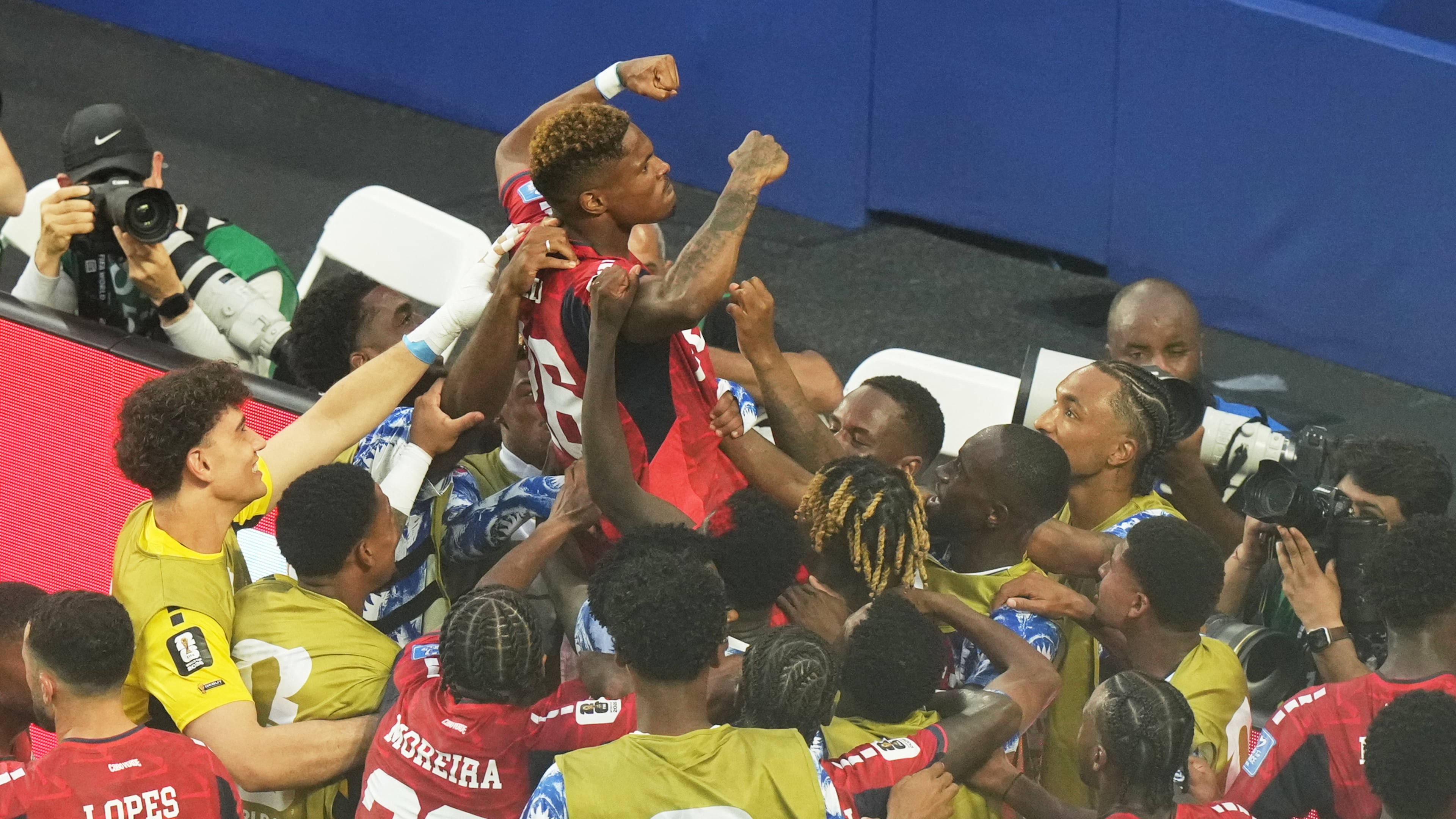 Cape Verde's Helio Varela, top, celebrates scoring his side's second goal against Uruguay during the World Cup Group H soccer match in Miami Gardens, Fla., Sunday, June 21, 2026. (AP Photo/Marta Lavandier)