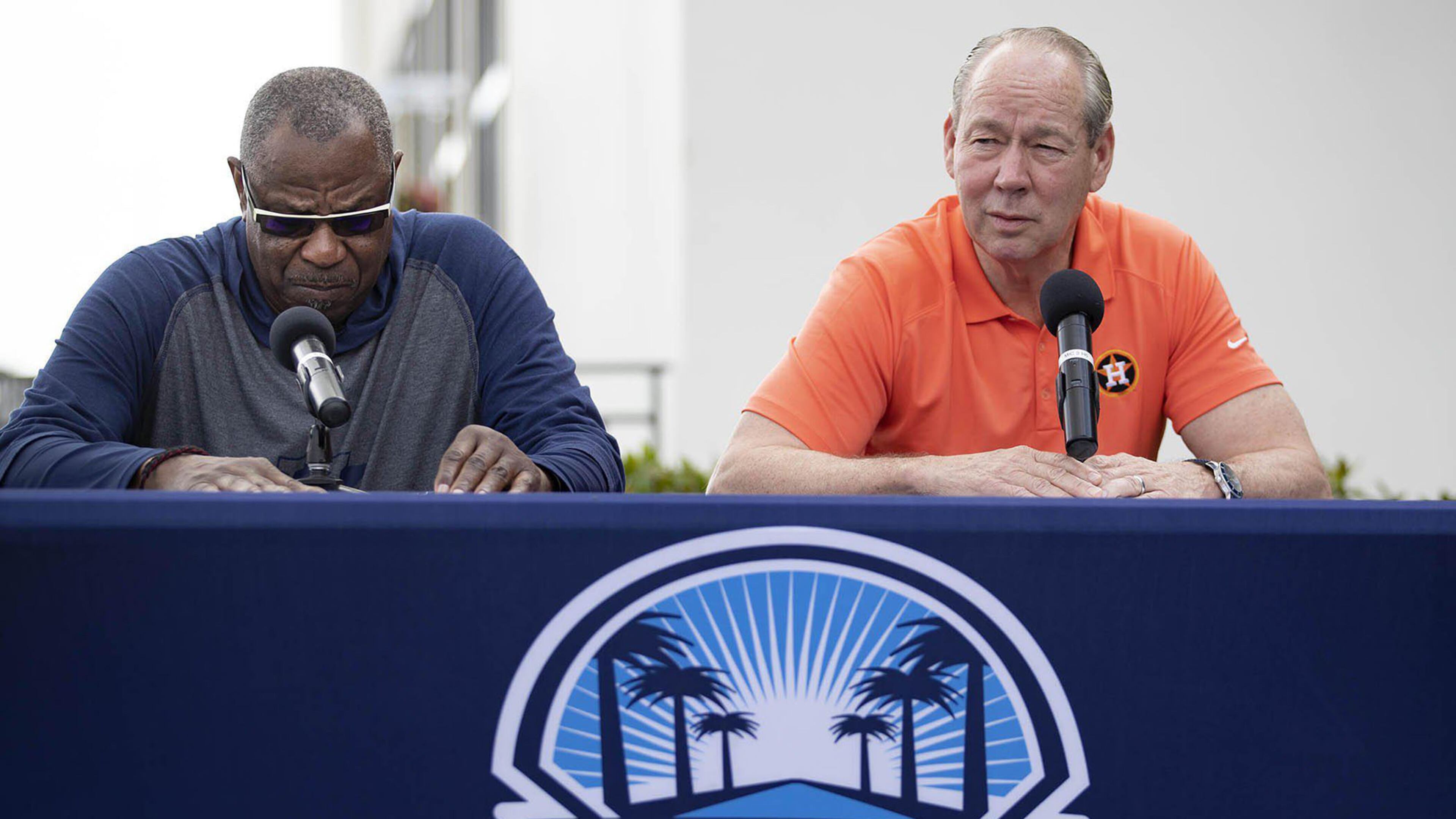 Houston Astros manager Dusty Baker, left, listens as team owner Jim Crane talks during a news conference before the start of spring training at Fitteam Ballpark of the Palm Beaches in West Palm Beach, Fla., on Thursday, Feb. 13, 2020.
