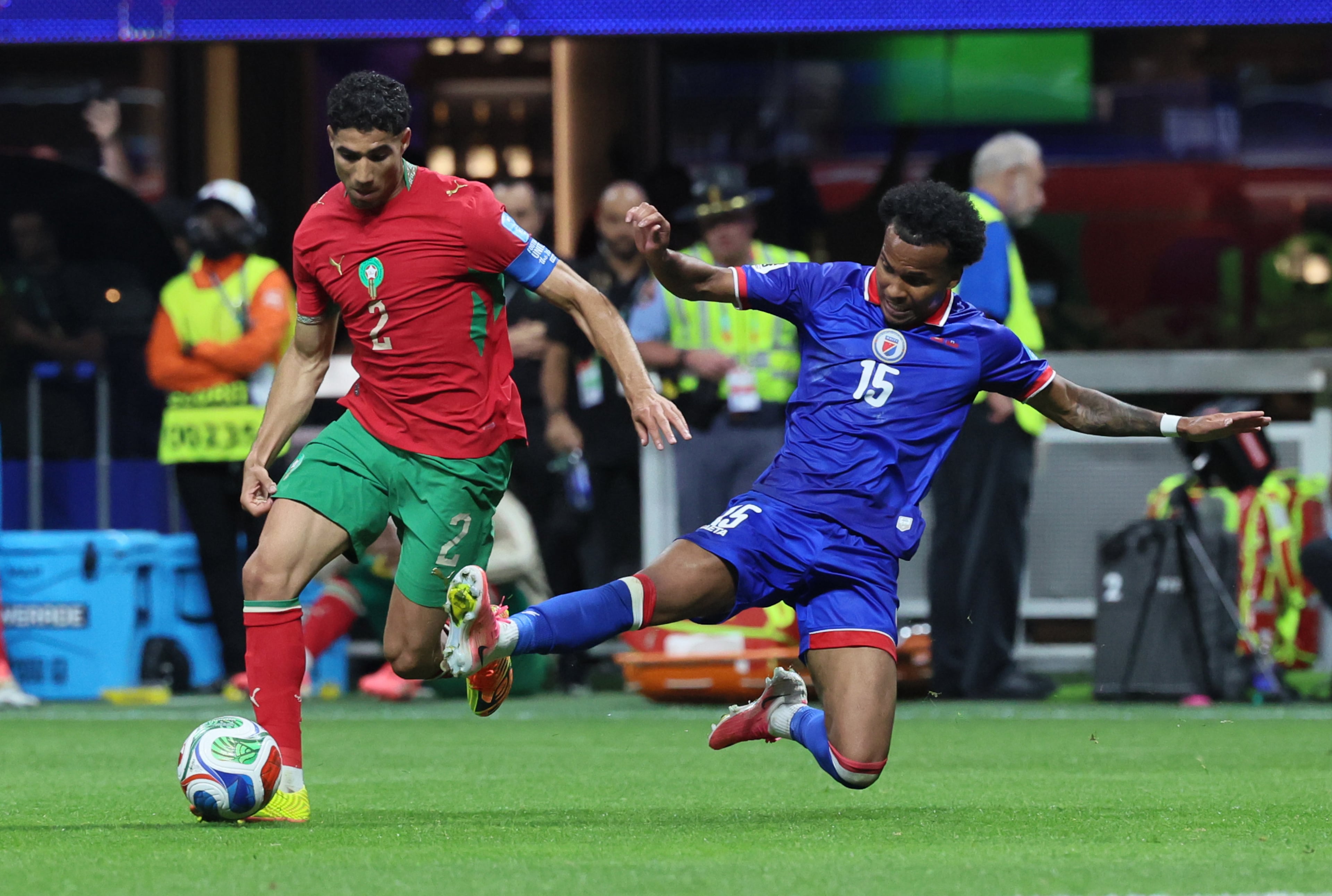Haiti's Ruben Providence, right tries to steal the ball from Morocco's Achraf Hakimi during second half of Morocco vs. Haiti Group C FIFA World Cup match at Atlanta Stadium (Mercedes-Benz Stadium) on Wednesday, June 24, 2026. (Jason Getz/AJC)