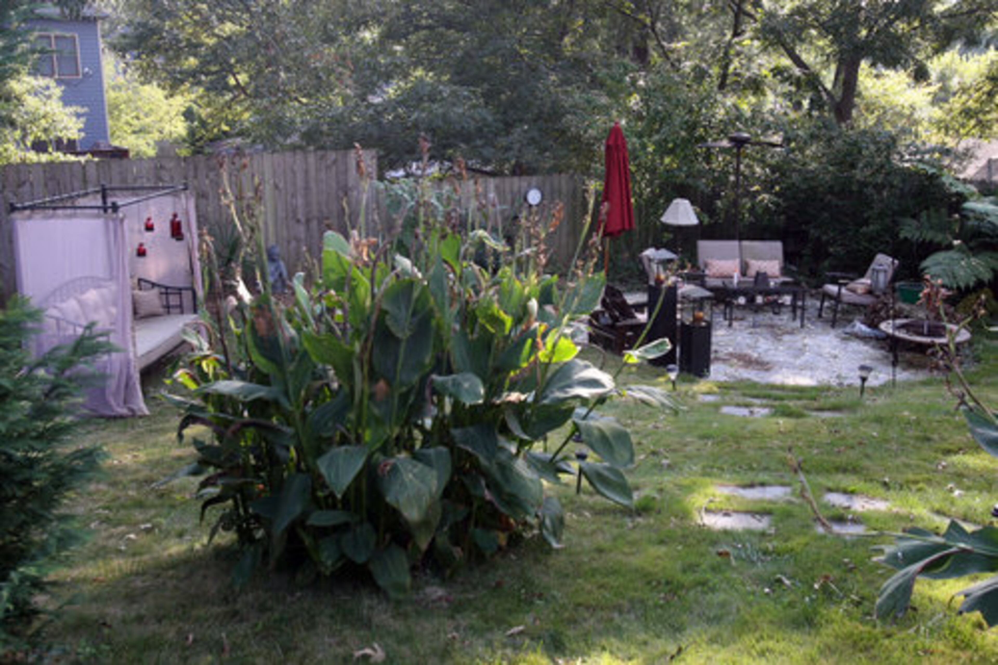 The Bolognese/McCord backyard features seating, a fire pit, an outdoor fan, and plenty of green. The couple spend time out there almost every day from May to November. It will be featured on a neighborhood home tour Oct. 18 and 19.