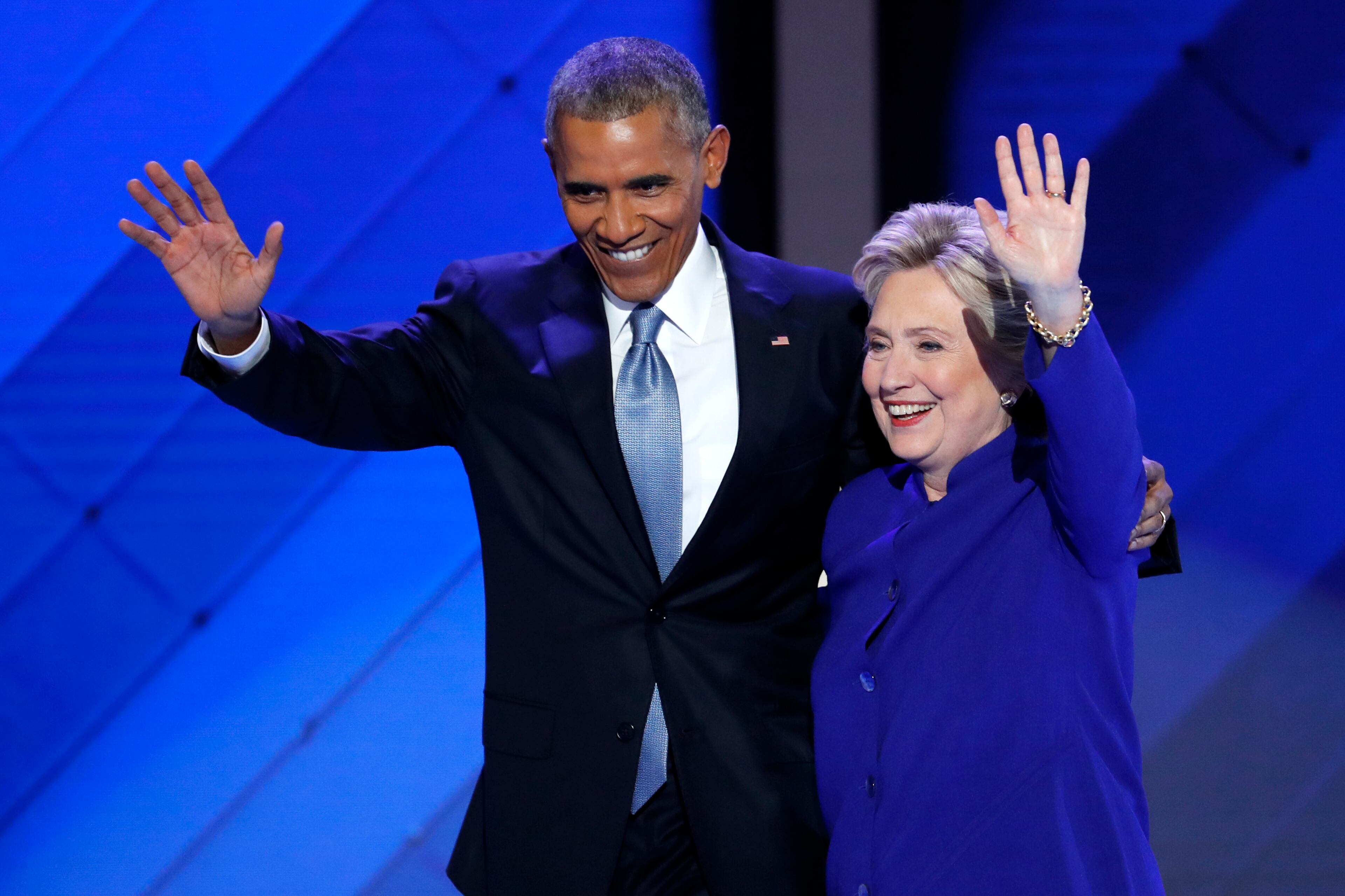 President Barack Obama and Democratic Presidential nominee Hillary Clinton wave to delegates after President Obama's speech during the third day of the Democratic National Convention in Philadelphia on Wednesday, July 27, 2016. (AP Photo/J. Scott Applewhite)