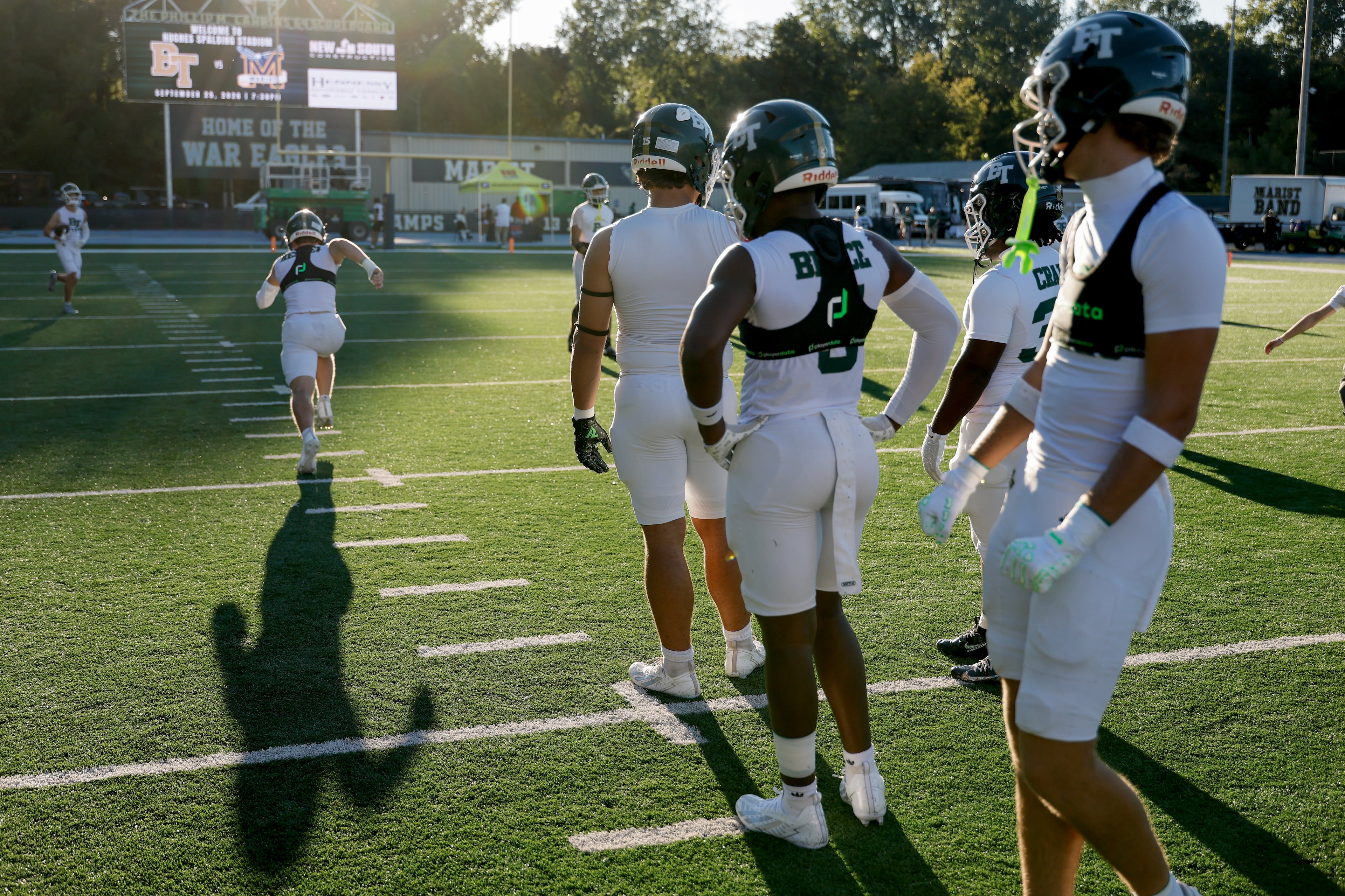 Blessed Trinity football players warm up before their game against Marist on Friday, Sept. 25, 2026, in Atlanta. (Erik S. Lesser for the AJC)