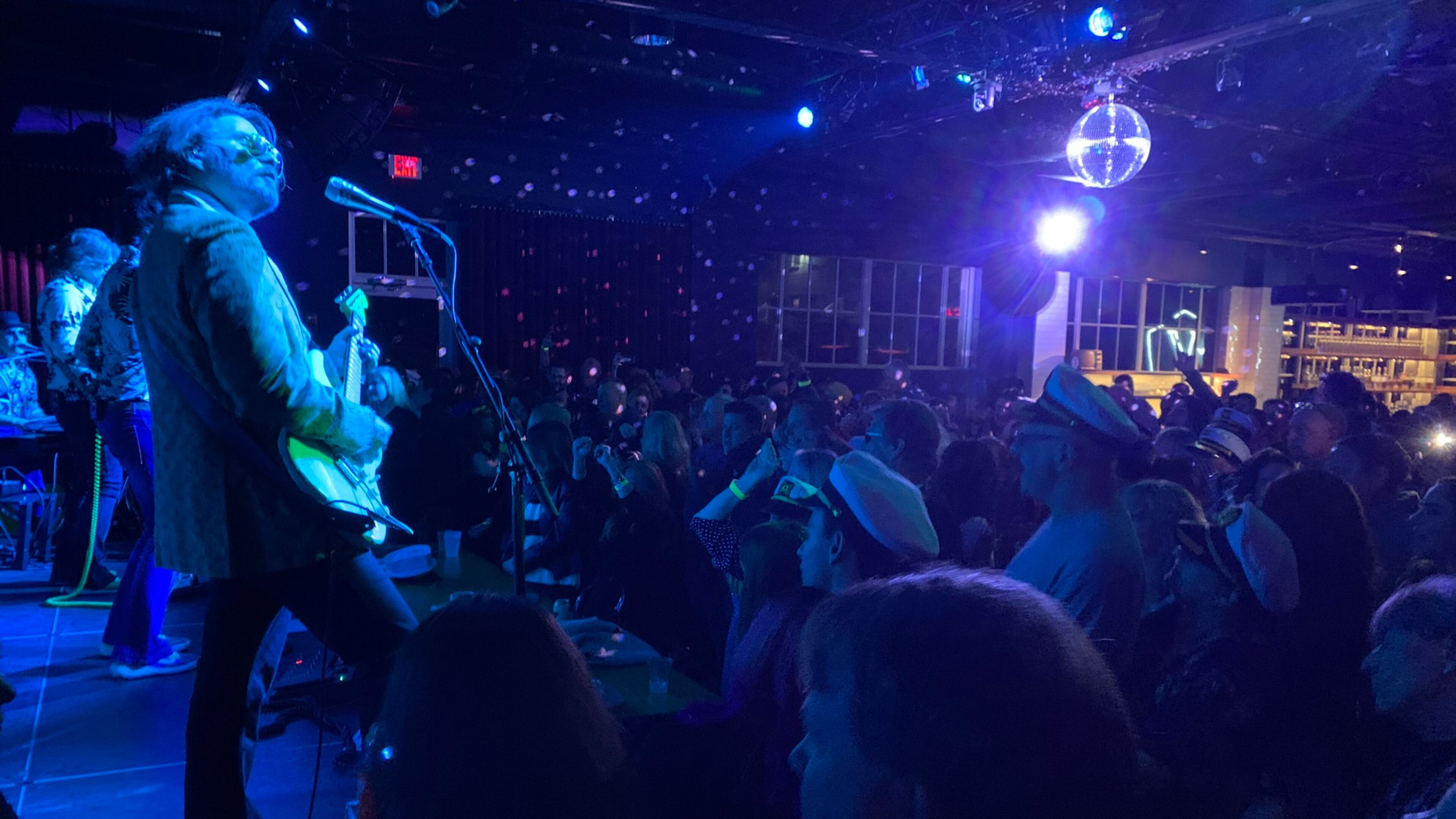 Mark "Monkeyboy" Dannells (left) during the Turkey Eve concert Yacht Rock Revue held at a full Venkman's in Atlanta Nov. 24, 2021. RODNEY HO/rho@ajc.com