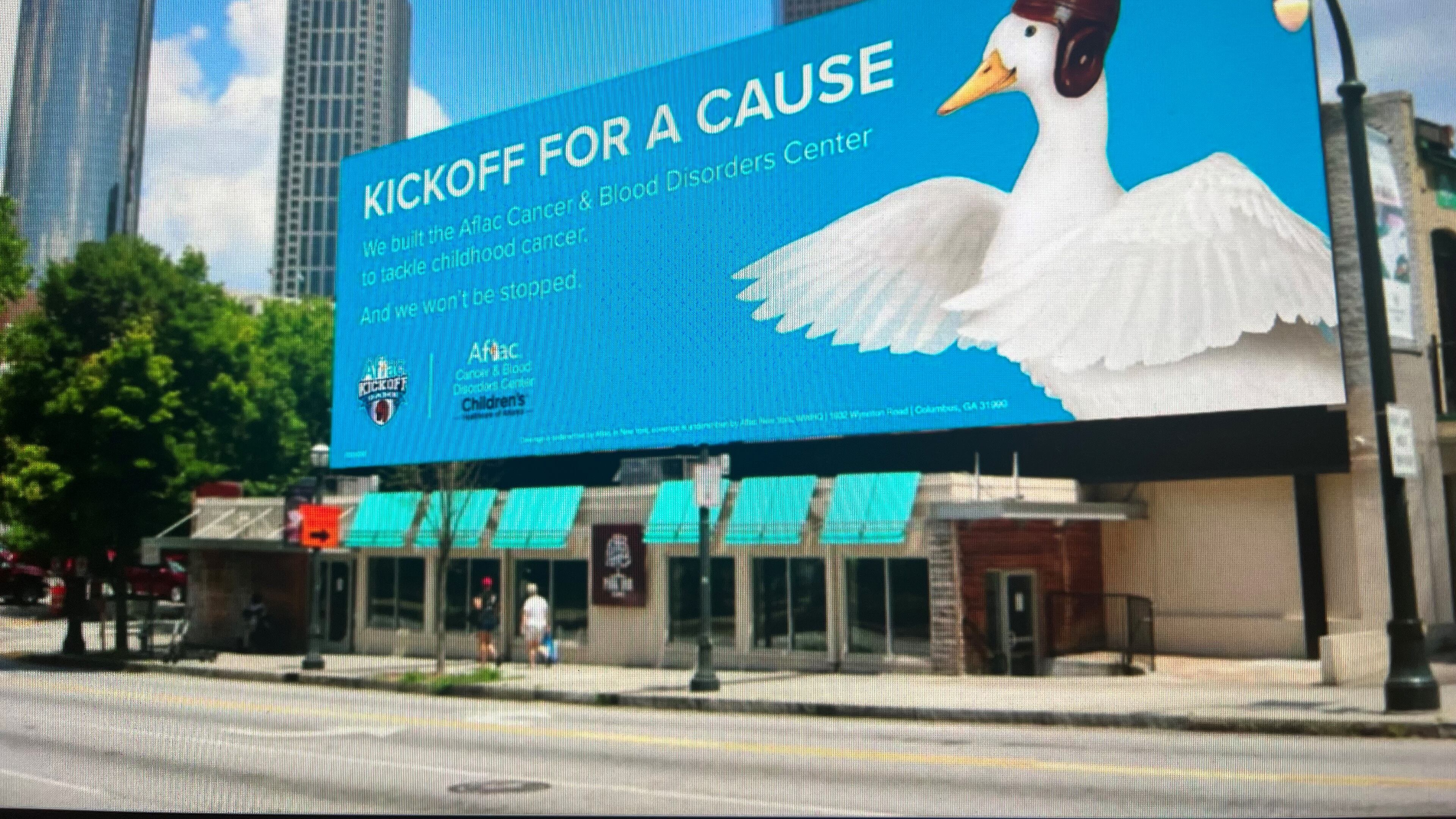 This is a promotional billboard for the Aflac Kickoff Game, which will take place Sept. 1, 2023.