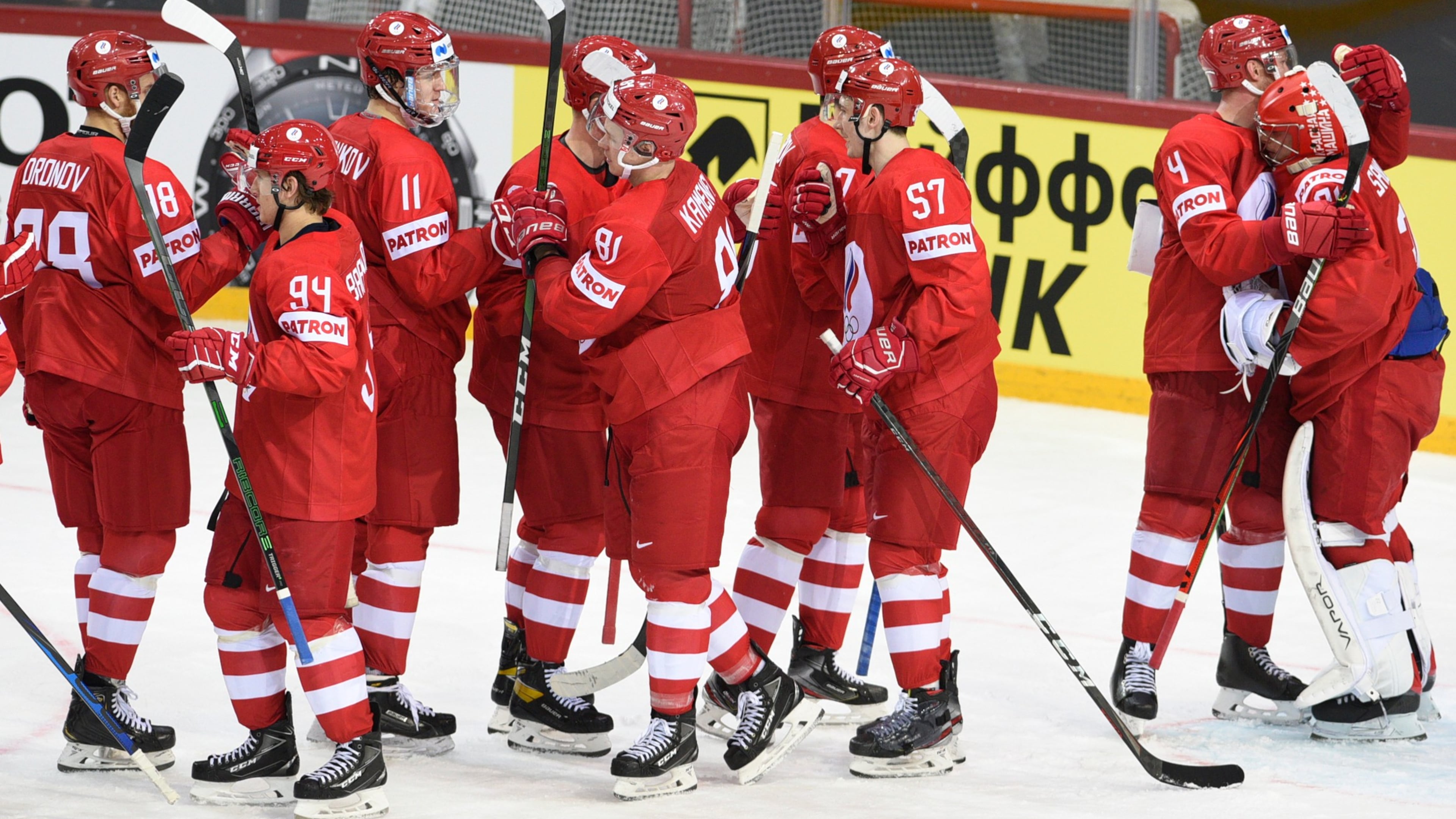 FILE - Team of Russia players celebrate during the Ice Hockey World Championship group A match between the Russia and Czech Republic at the Olympic Sports Center in Riga, Latvia, May 21, 2021. (AP Photo/Oksana Dzadan, File)
