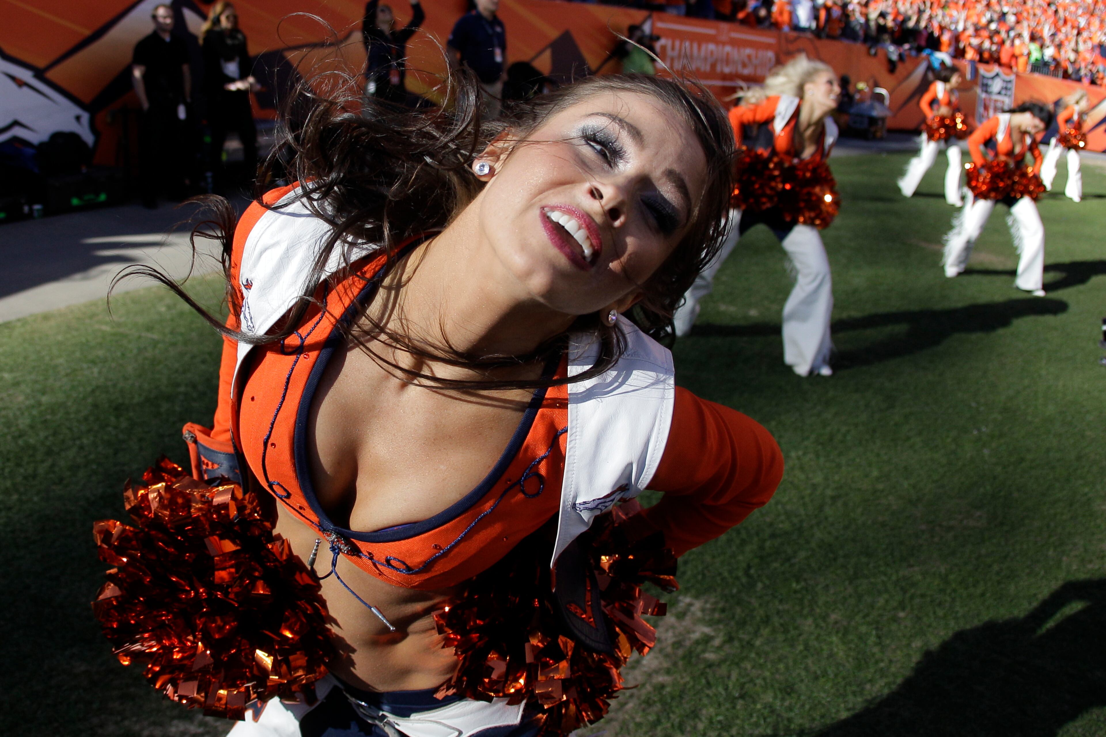 The Denver Broncos cheerleaders performs during the first half of the AFC Championship NFL playoff football game against the New England Patriots in Denver on Jan. 19, 2014.