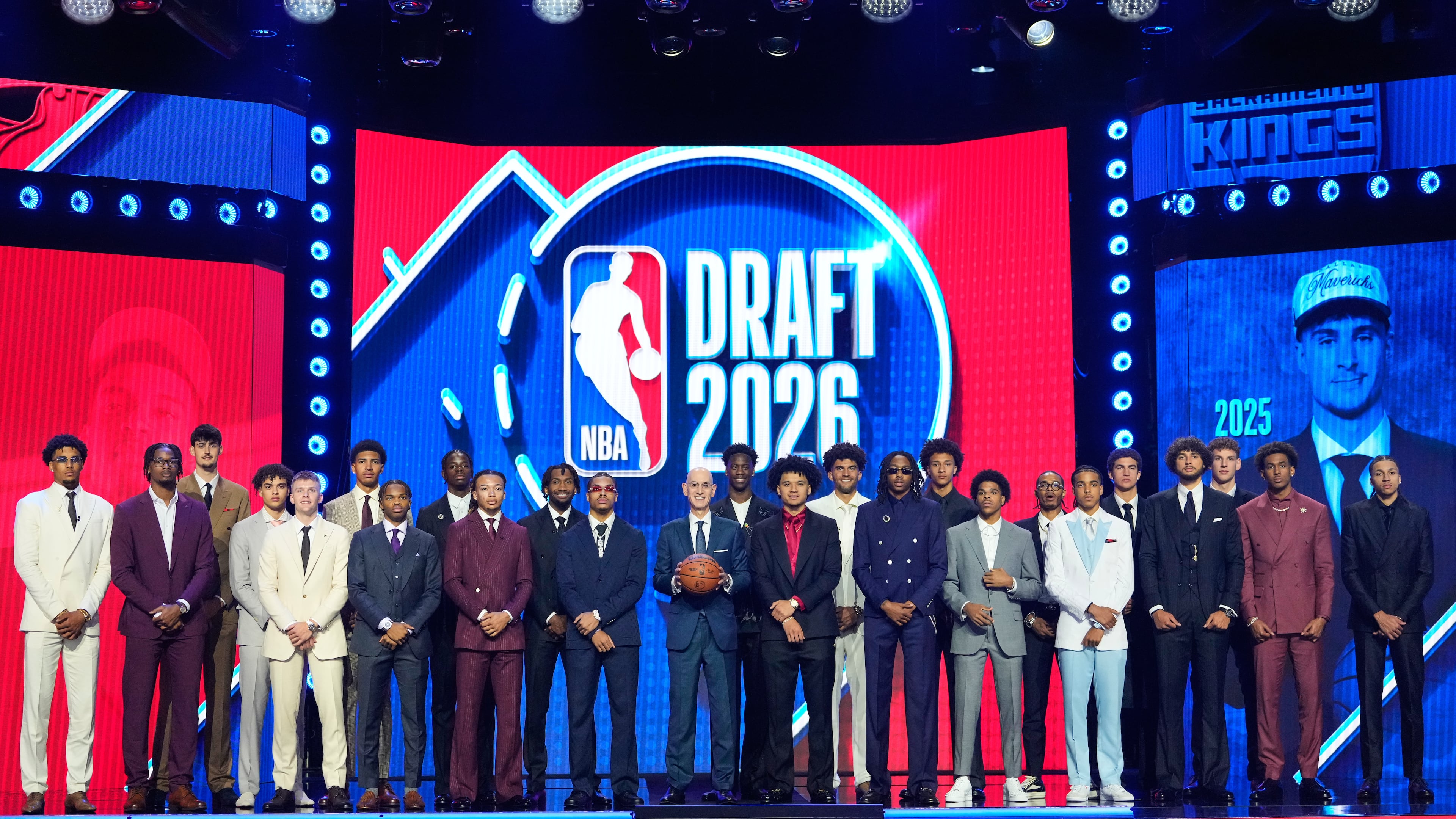 Prospective draftees pose for a group photo with NBA Commissioner Adam Silver, center, before the first round of the NBA basketball draft, Tuesday, June 23, 2026, in New York. (AP Photo/Yuki Iwamura)