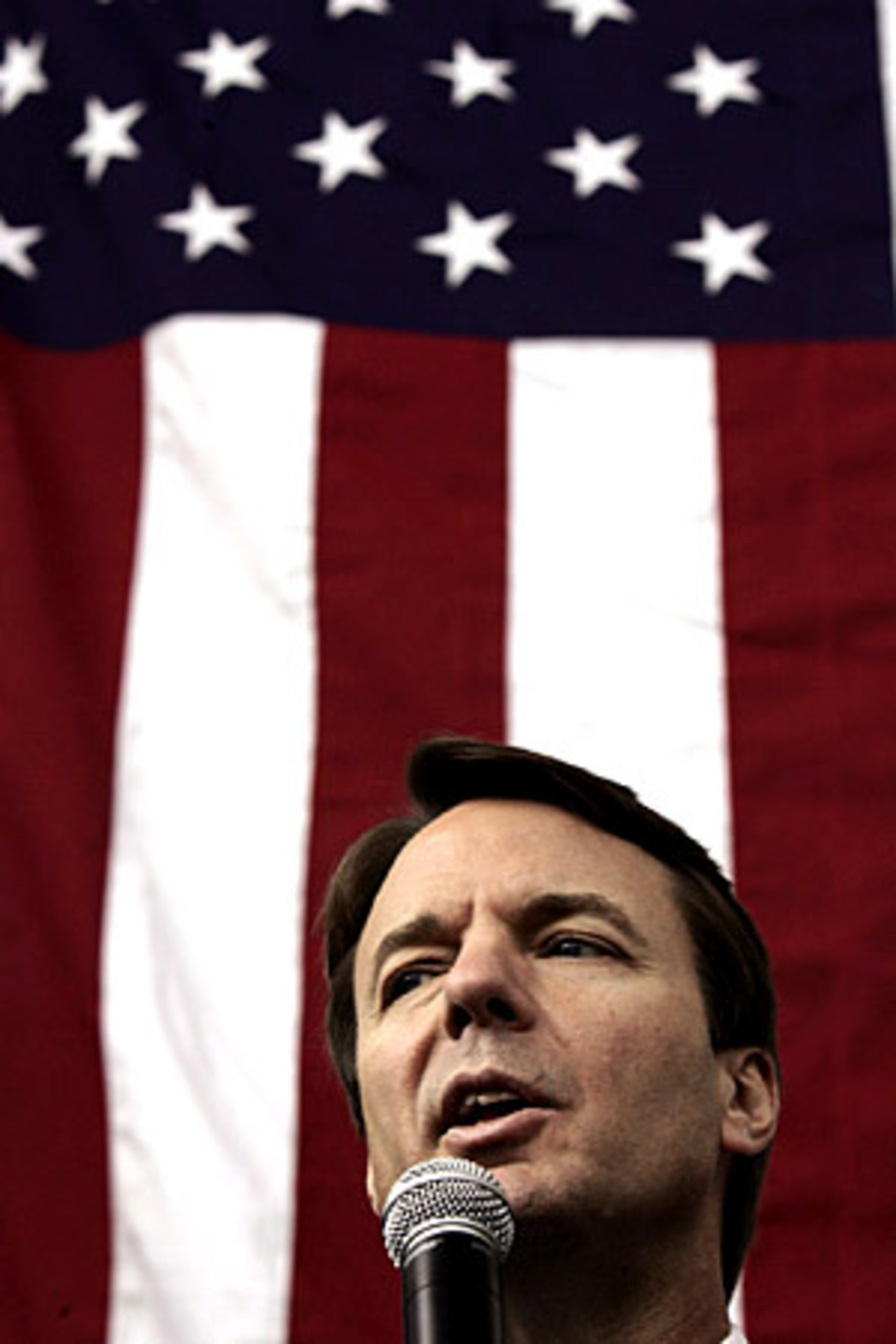 Democratic presidential hopeful John Edwards speaks Monday during a campaign stop in Storm Lake, Iowa.