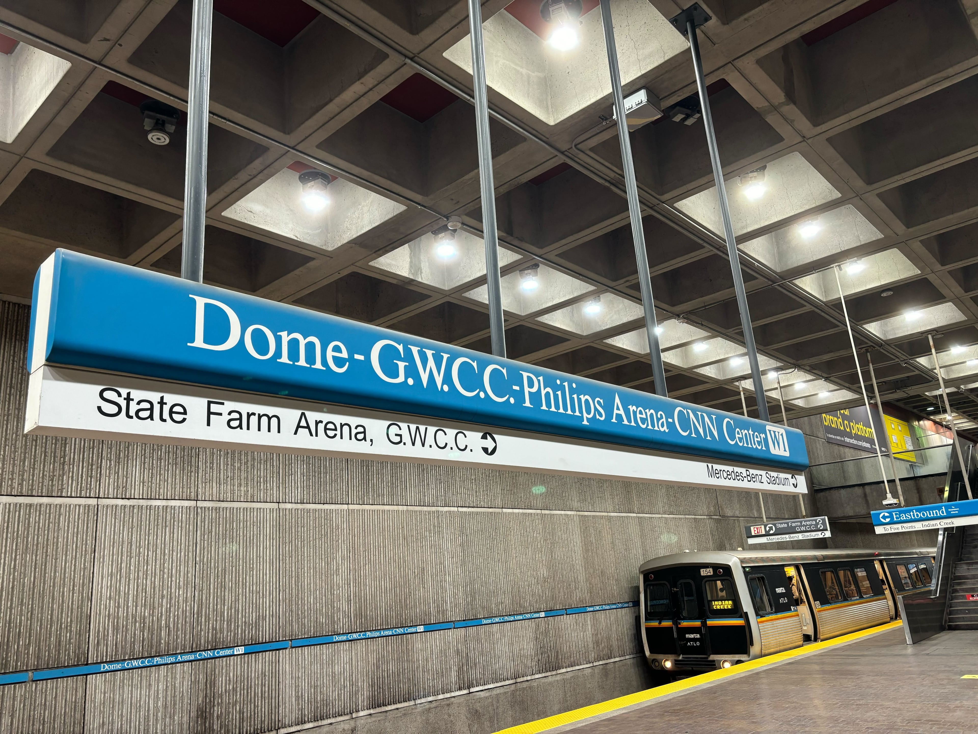 The obsoletely-named Georgia World Congress Center/CNN Center MARTA station serves visitors to Mercedes-Benz Stadium and State Farm Arena. The station will be renamed Sports Entertainment and Convention District before Atlanta hosts World Cup games next year. (Jozsef Papp-Chang/AJC 2024)
