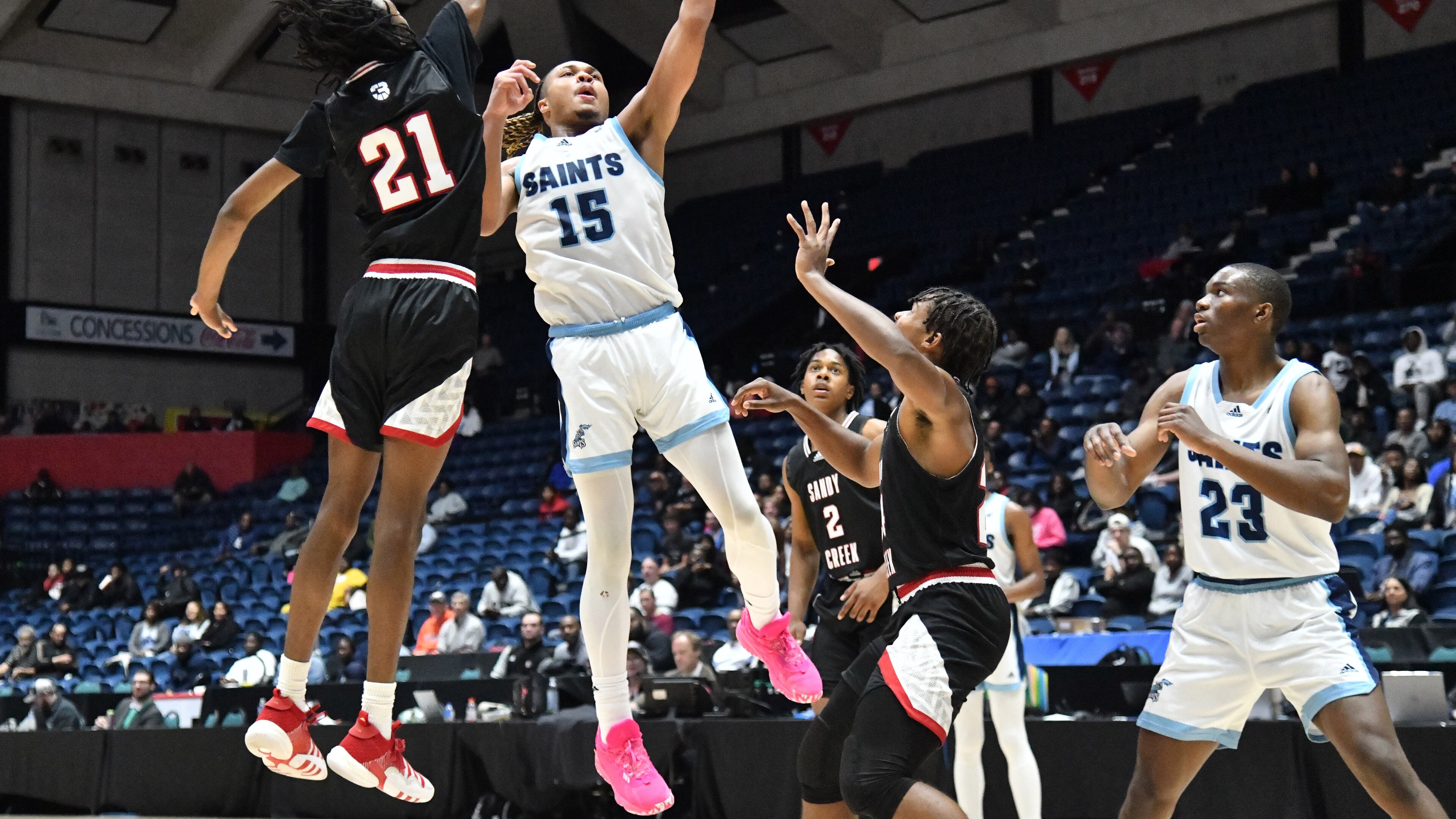 Cedar Grove's Darius Reynolds (15) shoots against Sandy Creek's Kani Rashied-Henry (21) during 2023 GHSA Basketball Class 3A Boy’s State Championship game at the Macon Centreplex, Friday, March 10, 2023, in Macon, GA. Sandy Creek won 66-38 over Cedar Grove. (Hyosub Shin / Hyosub.Shin@ajc.com)