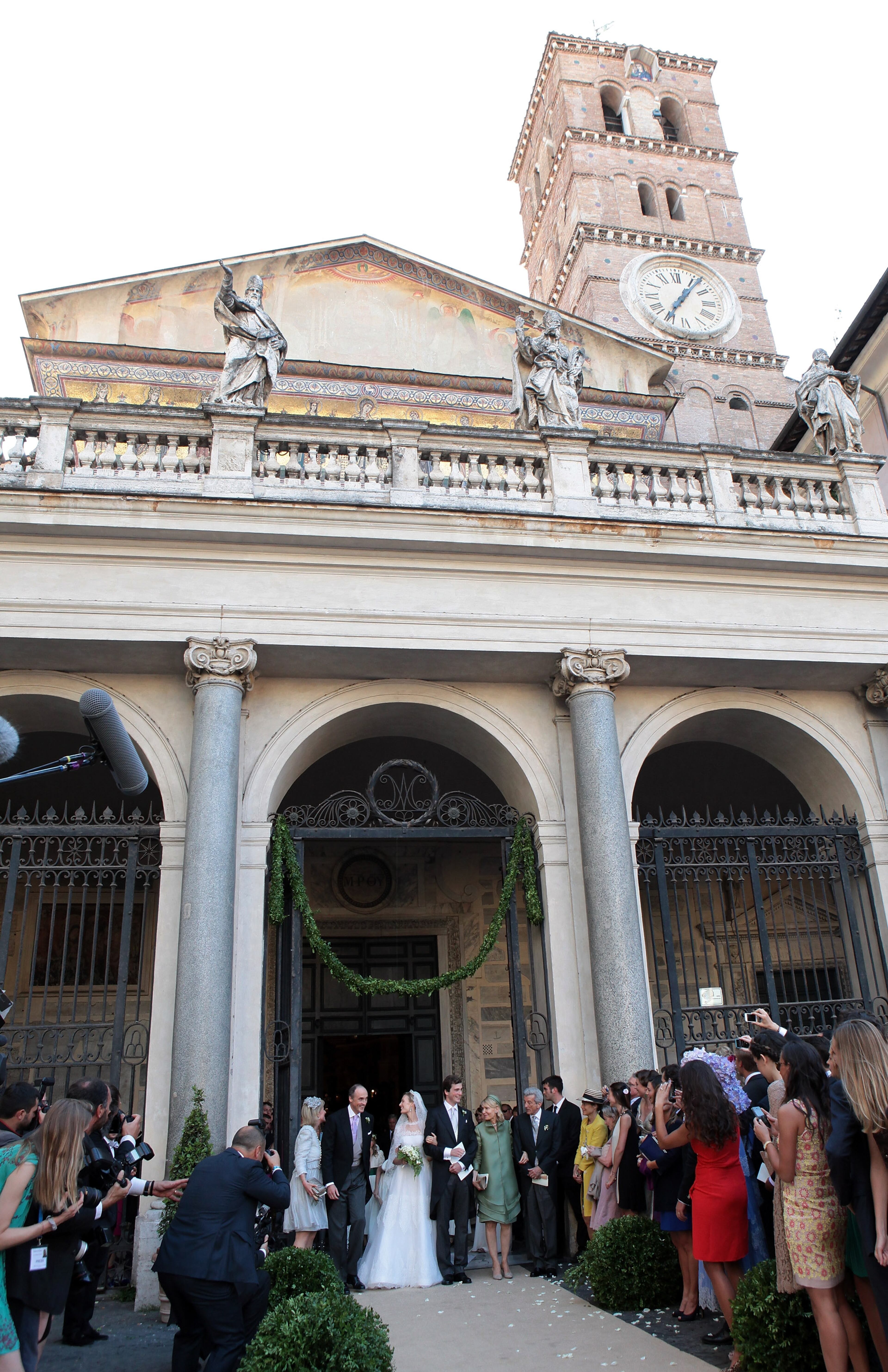 ROME, ITALY - JULY 05: Prince Amedeo of Belgium and Princess Elisabetta Maria celebrate after their wedding ceremony at Basilica Santa Maria in Trastevere on July 5, 2014 in Rome, Italy. (Photo by Elisabetta Villa/Getty Images)