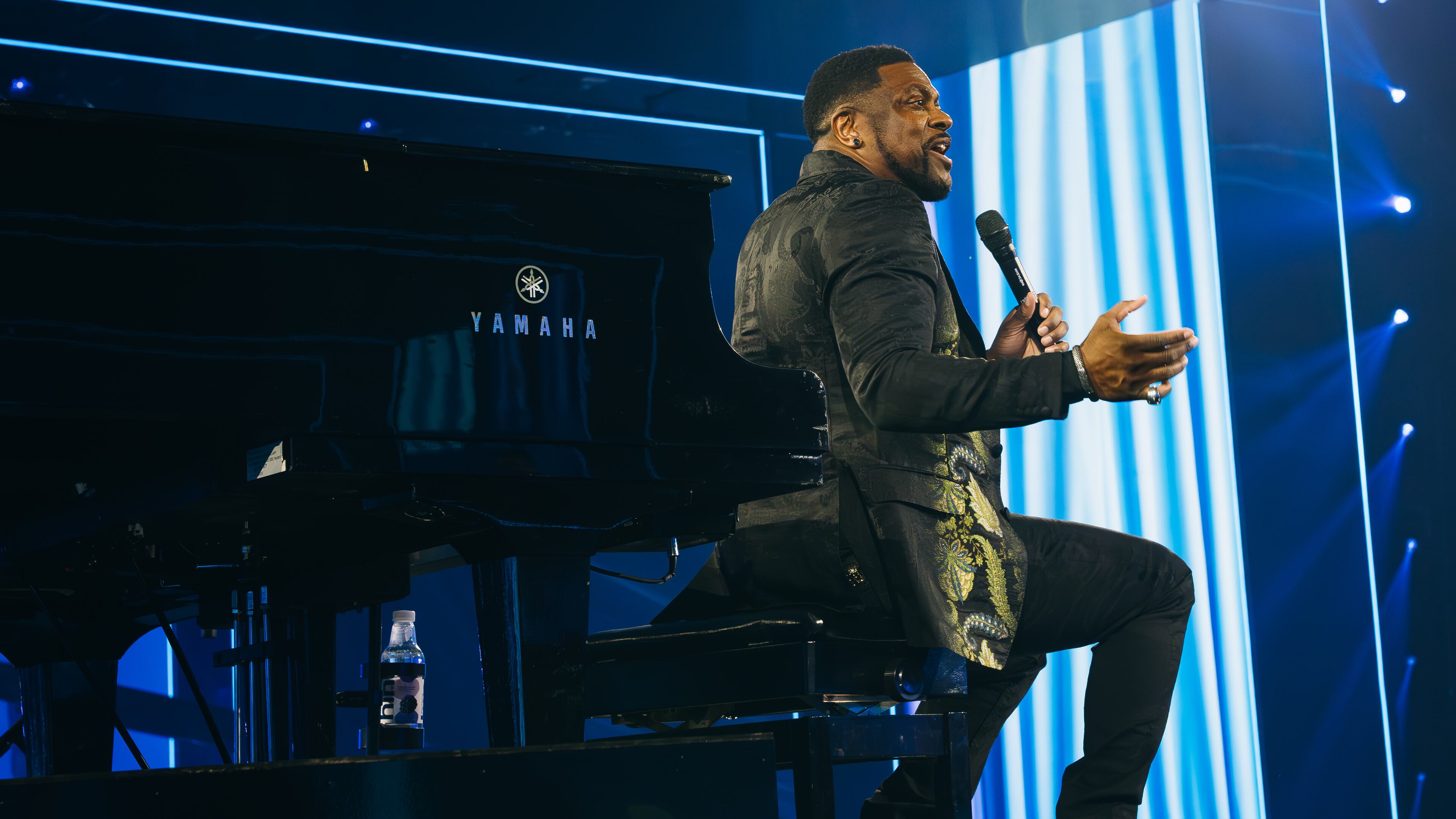 Actor and comedian Chris Tucker performs at the Beloved Benefit, which raised $8.8 million during its annual event at the Georgia World Congress Center on Thursday, Aug. 24, 2023, in Atlanta, Georgia. (Olivia Bowdoin for the AJC).