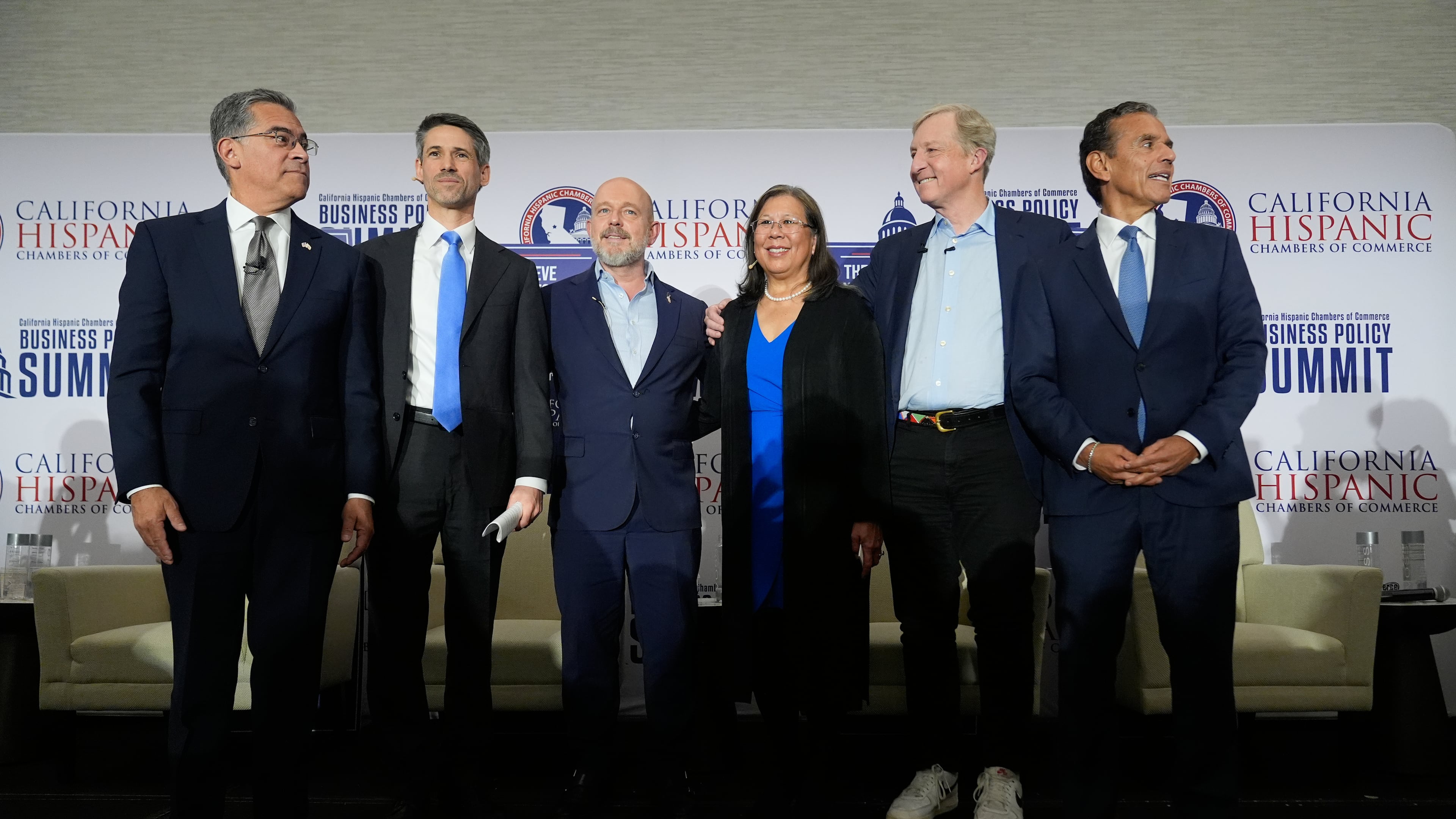 From left, Xavier Becerra, Matt Mahan, Steve Hilton, Betty Yee, Tom Steyer and Antonio Villaraigosa pose during a gubernatorial candidate forum in Sacramento, Calif., Tuesday, April 14, 2026. (AP Photo/Godofredo A. Vásquez)