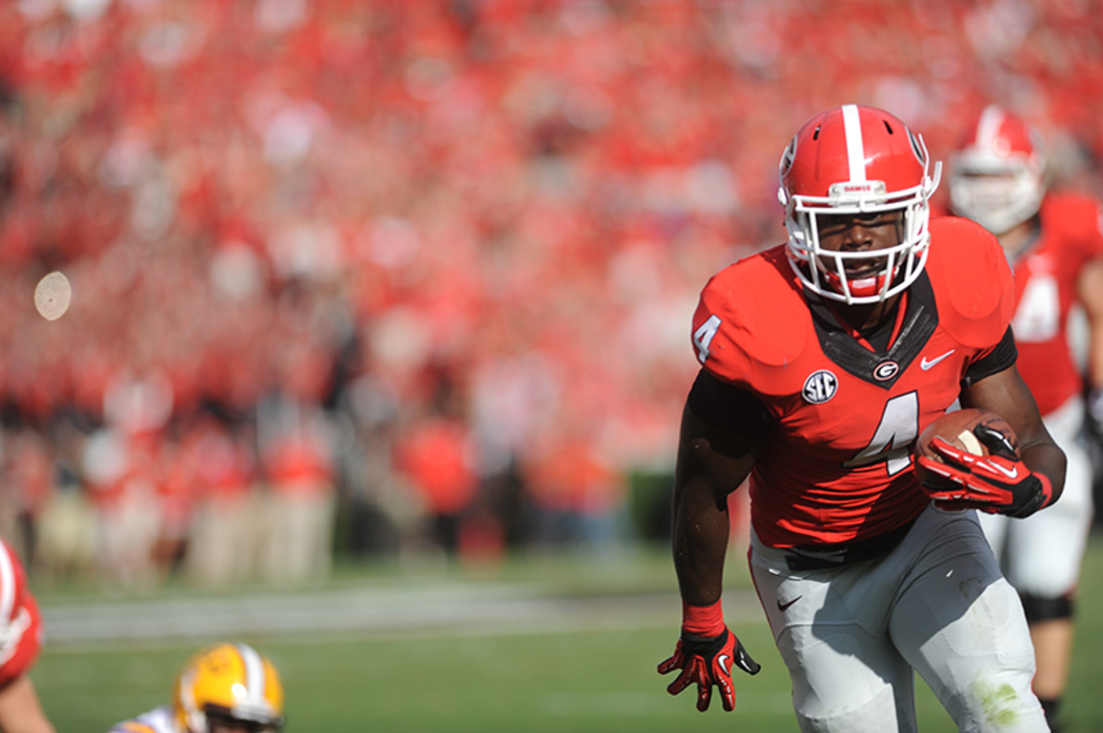 Sophomore tailback Keith Marshall (4) suffered an ACL tear to his right knee in the win against Tennessee. Marshall's injury occurred as he took an awkward hit.