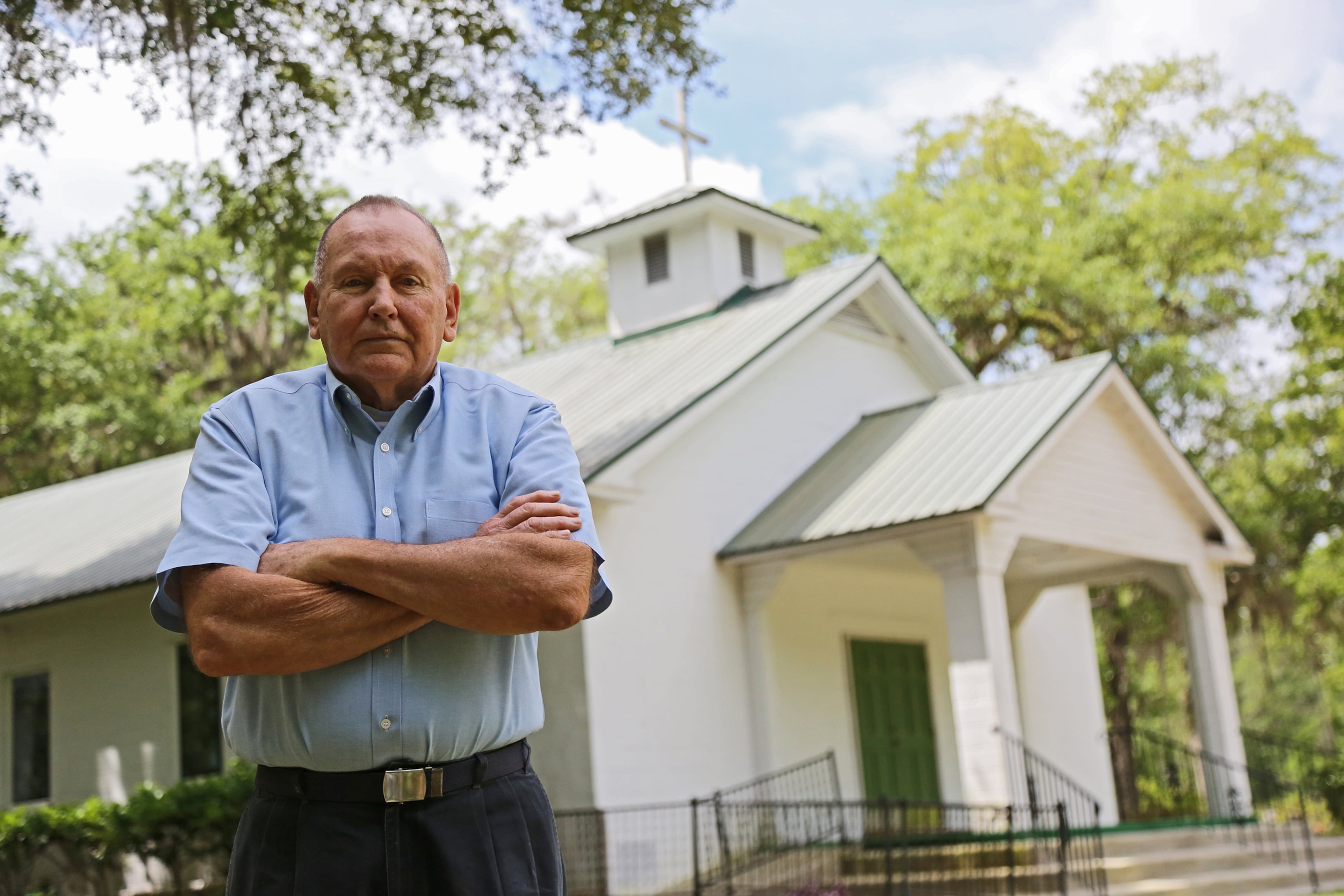 Butch Kennedy, former Camden County chief sheriff's deputy, tried for seven years to solve the 1985 murders at Rising Daughter Baptist Church. He believes that Dennis Perry, the man who another investigator later helped send to prison, is innocent. Kennedy is haunted by guilt that the case wouldn't have ended such a way if he'd solved it himself. (Tyson Horne/Tyson.Horne@ajc.com)