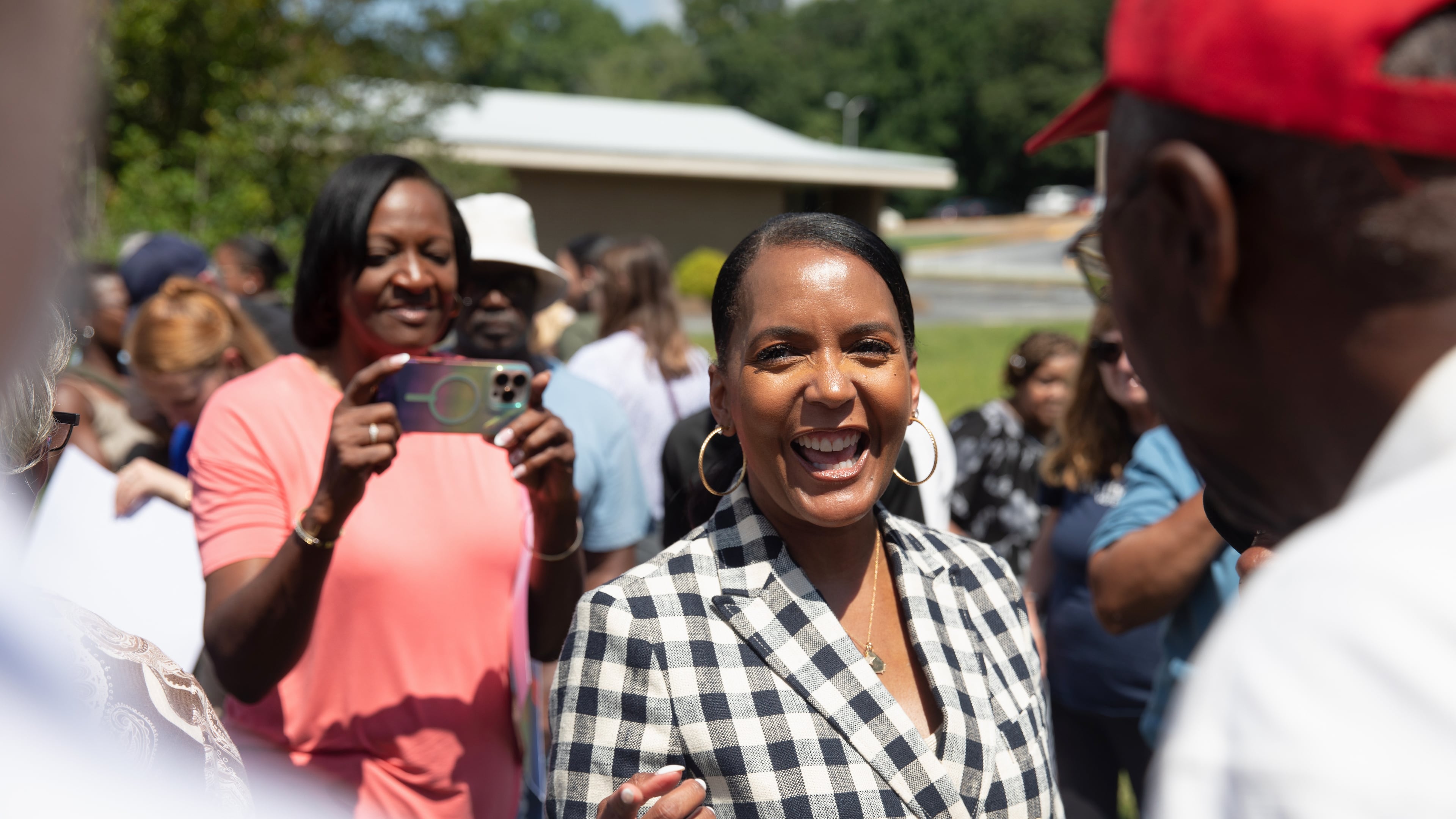 Democratic nominee for governor Keisha Lance Bottoms campaigns outside of a shuttered rural hospital in Commerce last month. (Riley Bunch/AJC)