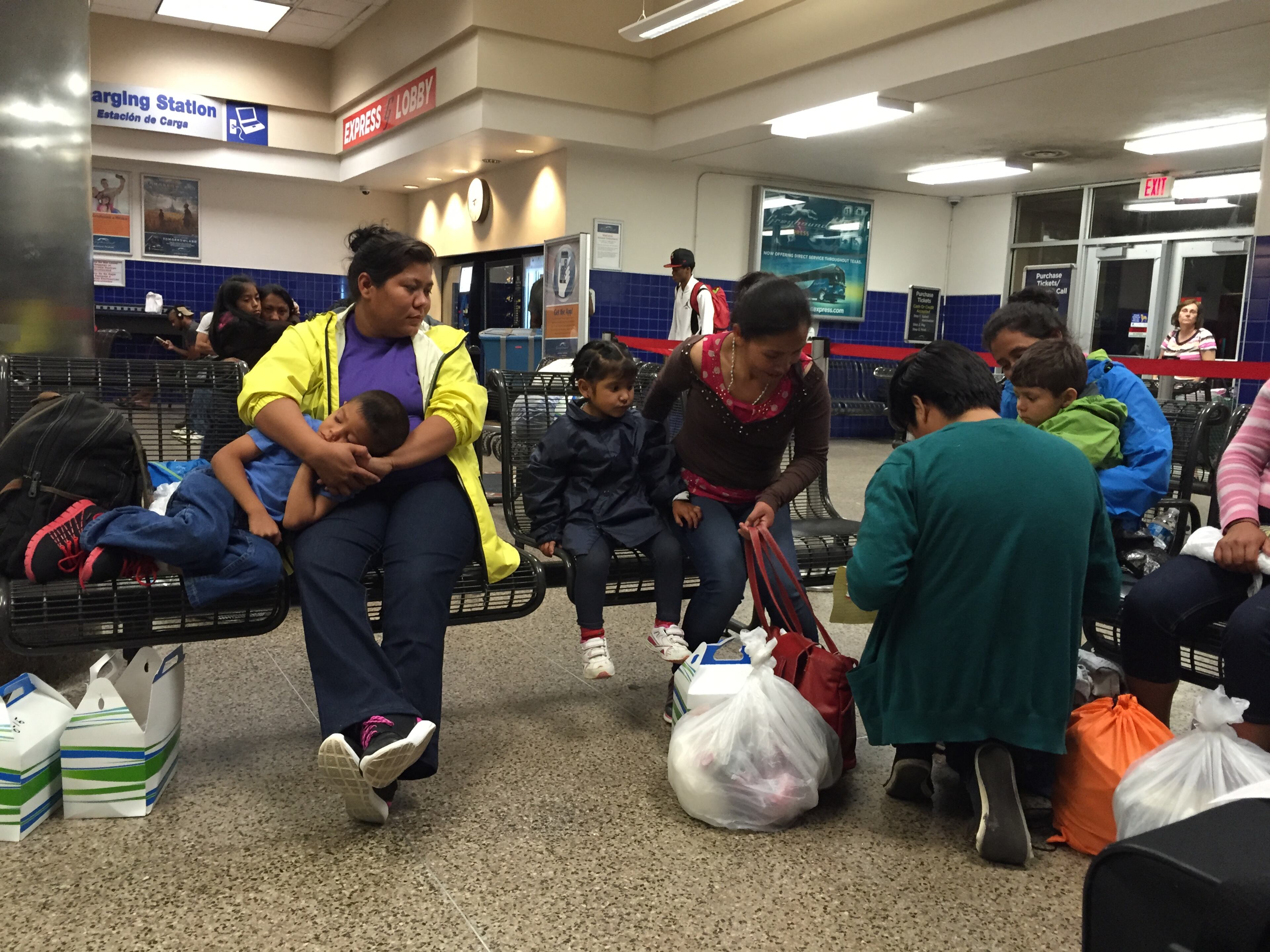 Nine families released from the South Texas Family Residential Center were dropped off at a downtown San Antonio bus station just past midnight one evening this month. Freed on bond, they were on their way to stay with friends and family in other states while they continue to fight to remain in the U.S.