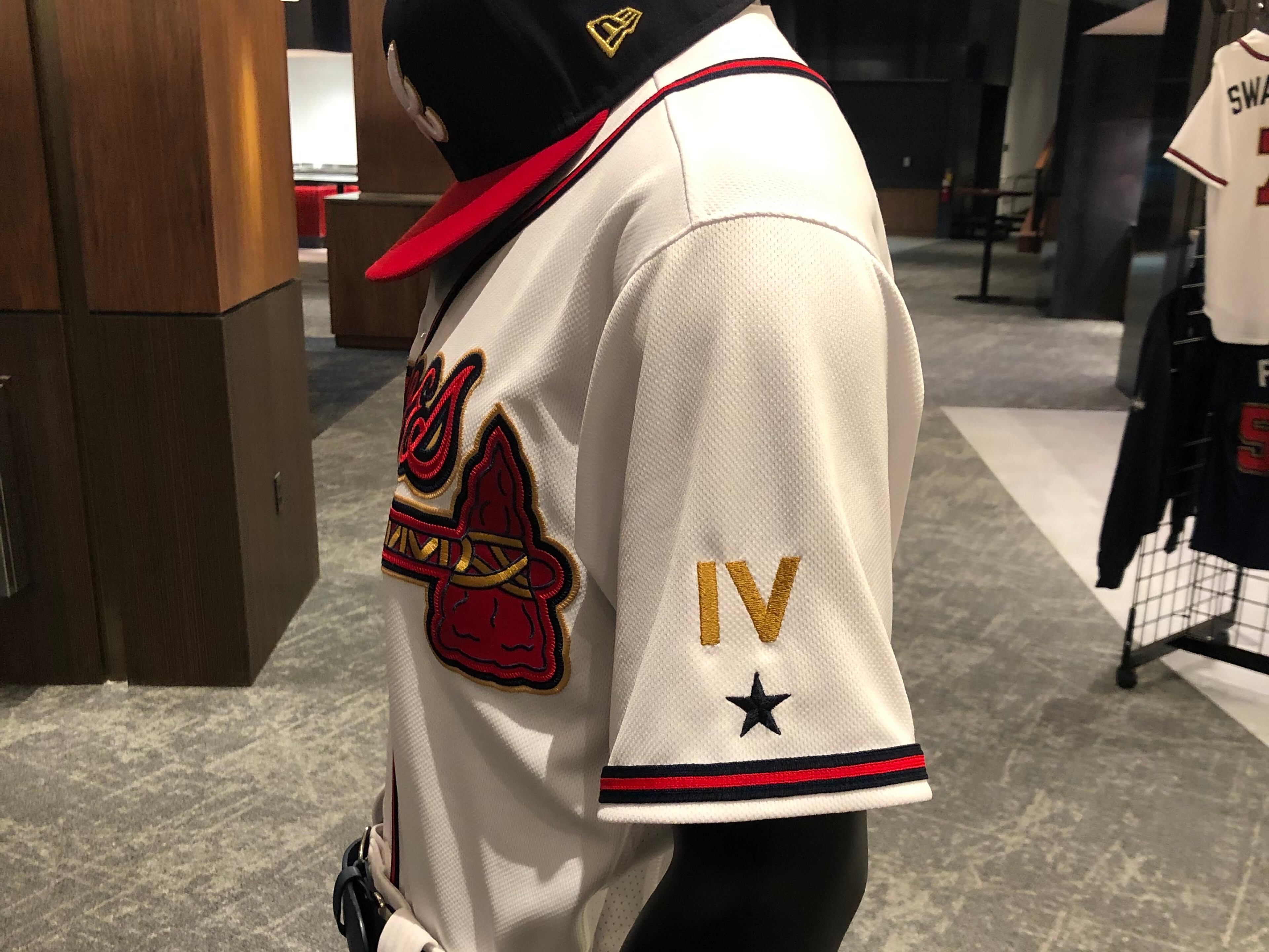 The Braves' "Gold Collection" uniform features the Roman numeral IV on the left sleeve, representing the number of World Series championships the franchise has won. (Photo by Tim Tucker / AJC)