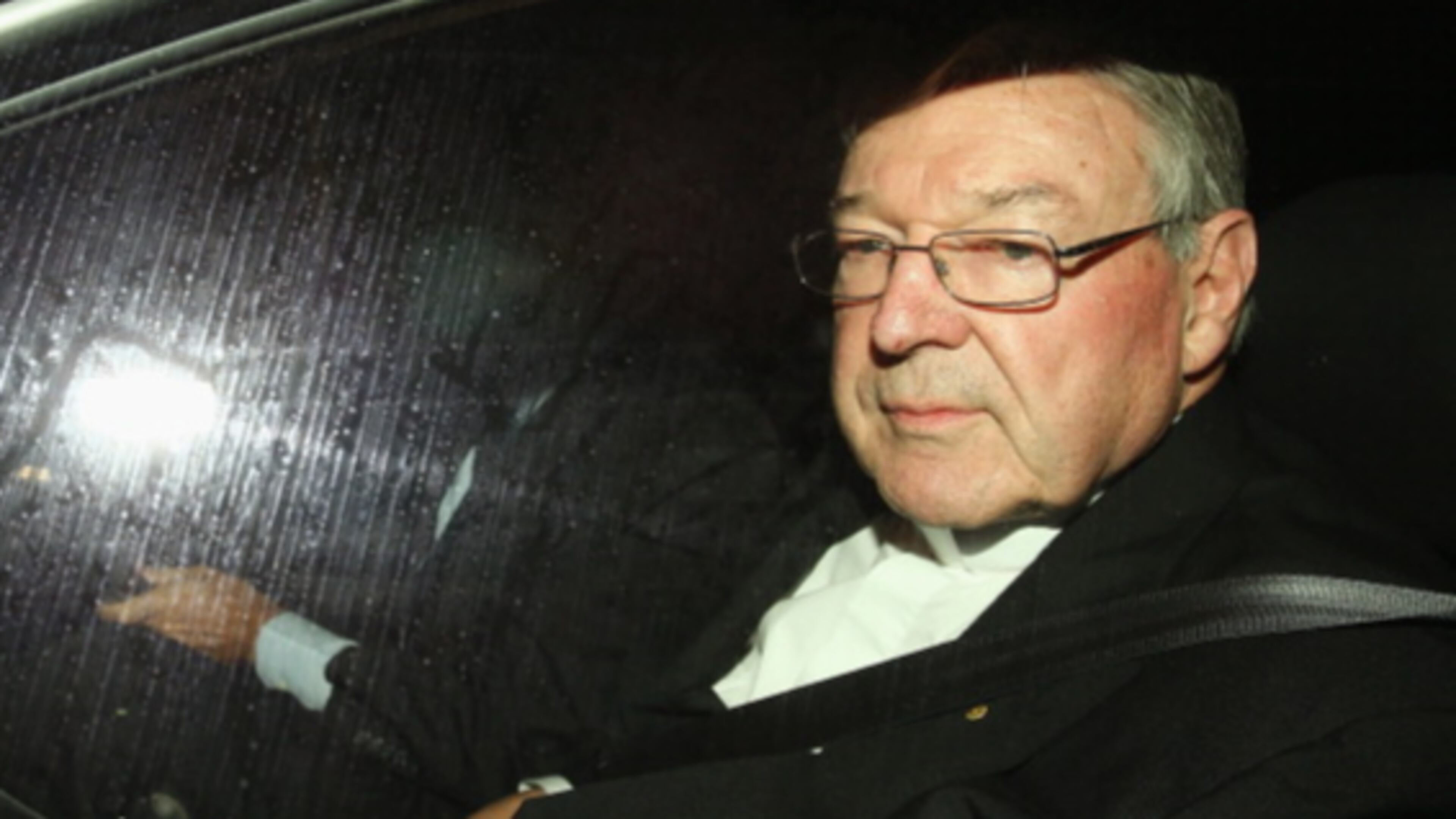 Cardinal George Pell is pictured here in Sydney, arriving for an appearance before the Royal Commission into Institutional Responses to Child Sexual Abuse in 2014. Pell was answering questions about whether he was involved in compensation discussions related to a different sexual abuse case involving a victim who was abused by another priest.