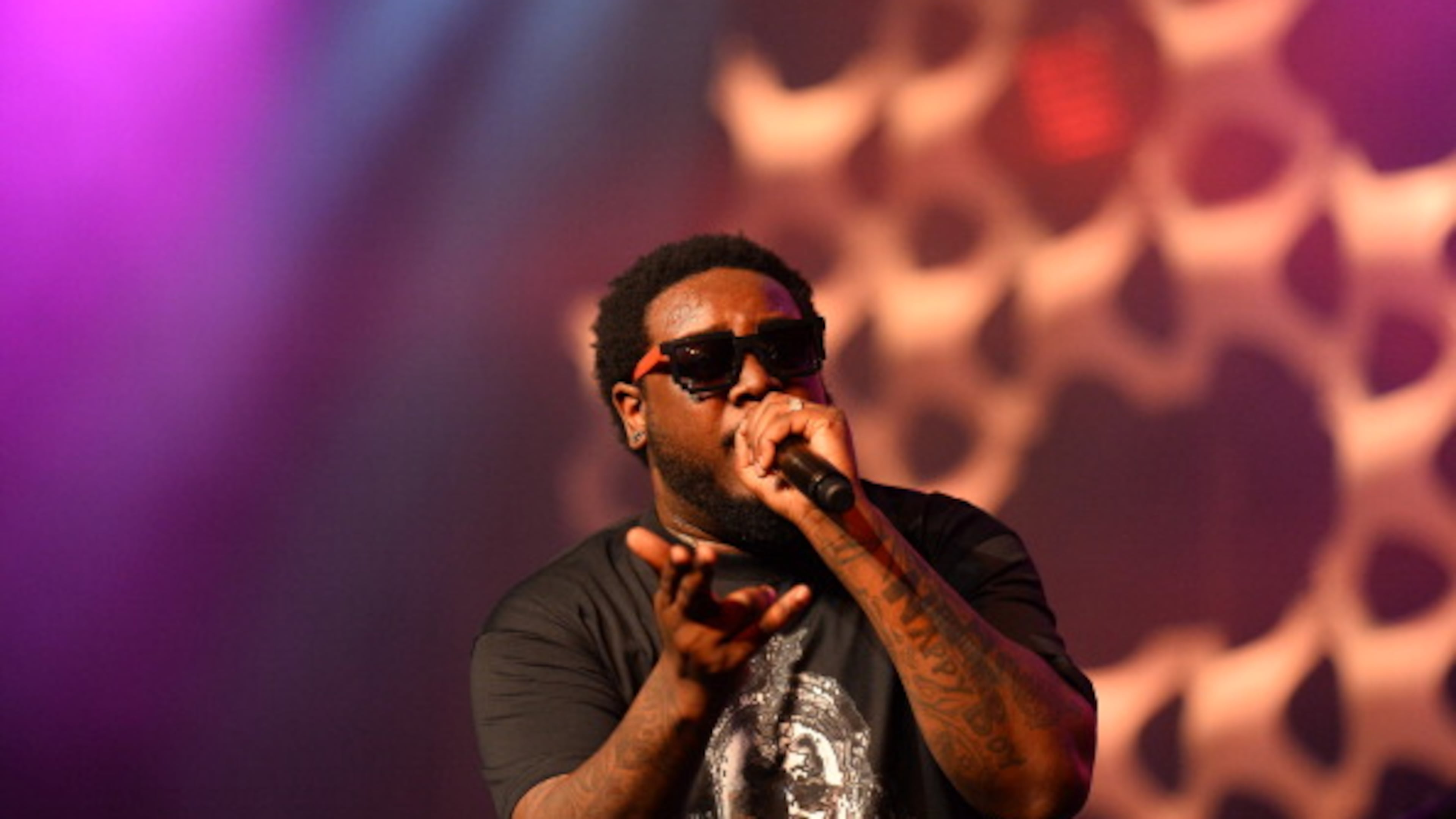 Rapper T-Pain and his bodyguard were questioned by Atlanta police in the Atlanta airport Friday after a gun was found at a TSA checkpoint, police said.