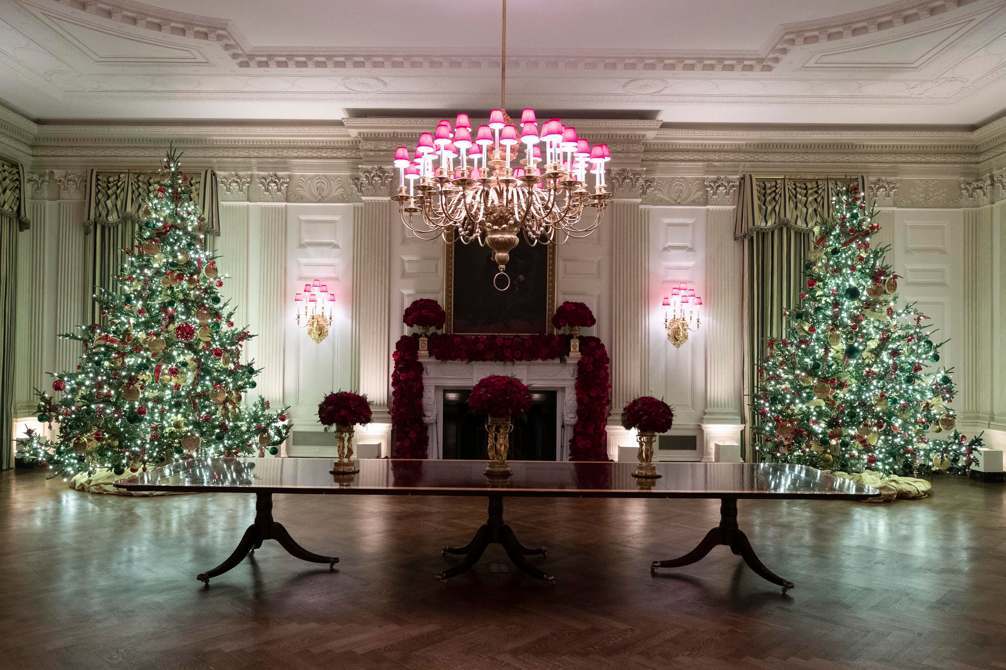 The State Dining Room is decorated during the 2019 Christmas preview at the White House, Monday, Dec. 2, 2019, in Washington. (AP Photo/Alex Brandon)