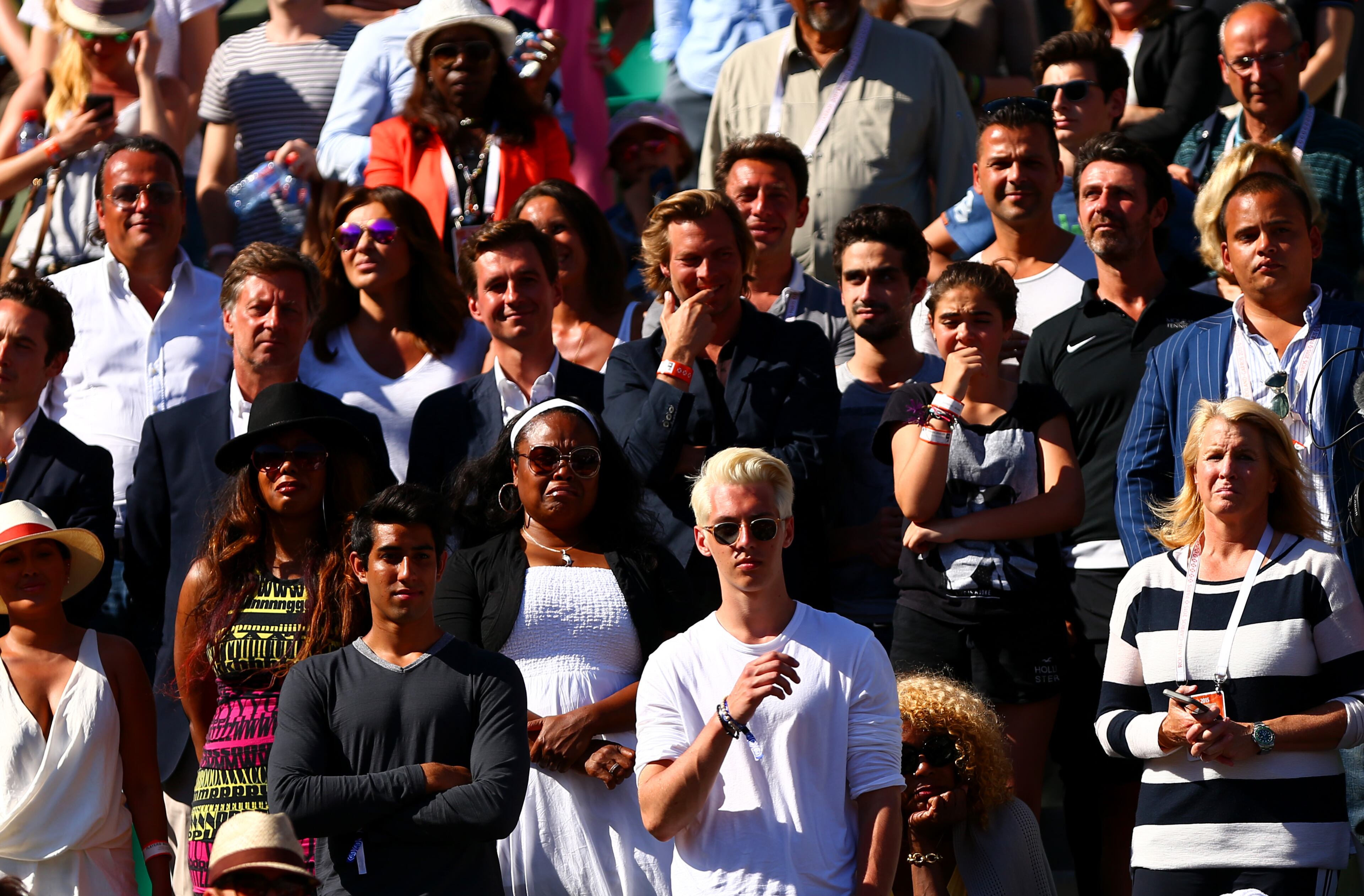 Members of Serena Williams of the United States' team and family watch as she receives the Coupe Suzanne Lenglen after winning the Women's Singles Final against Lucie Safarova of Czech Repbulic on day fourteen of the 2015 French Open at Roland Garros on June 6, 2015 in Paris, France. (Photo by Dan Istitene/Getty Images)
