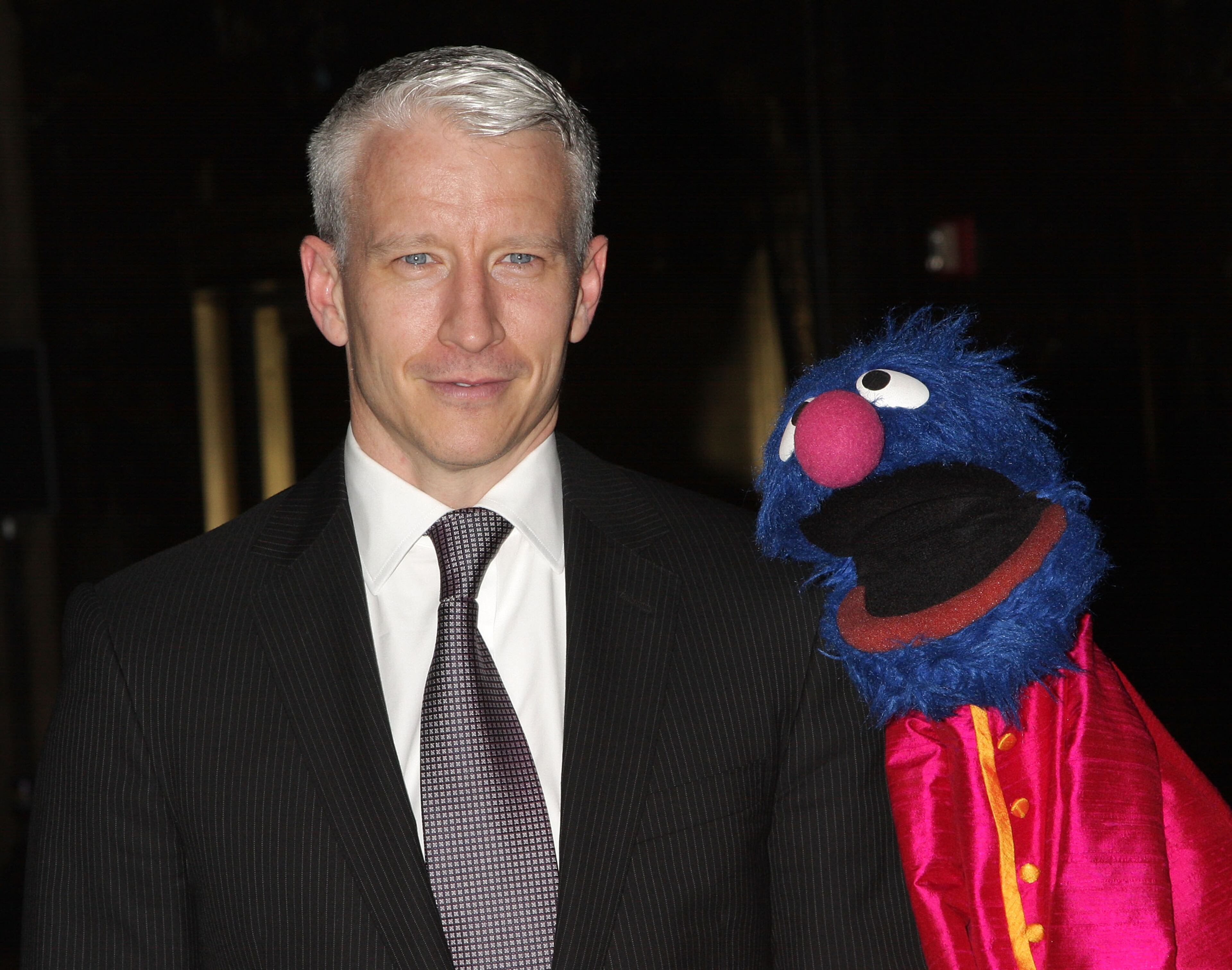 News Anchor Anderson Cooper poses with Grover at the 6th Annual Sesame Workshop Benefit Gala at Cipriani 42nd Street on May 28, 2008 in New York City. (Photo by Will Ragozzino/Getty Images)