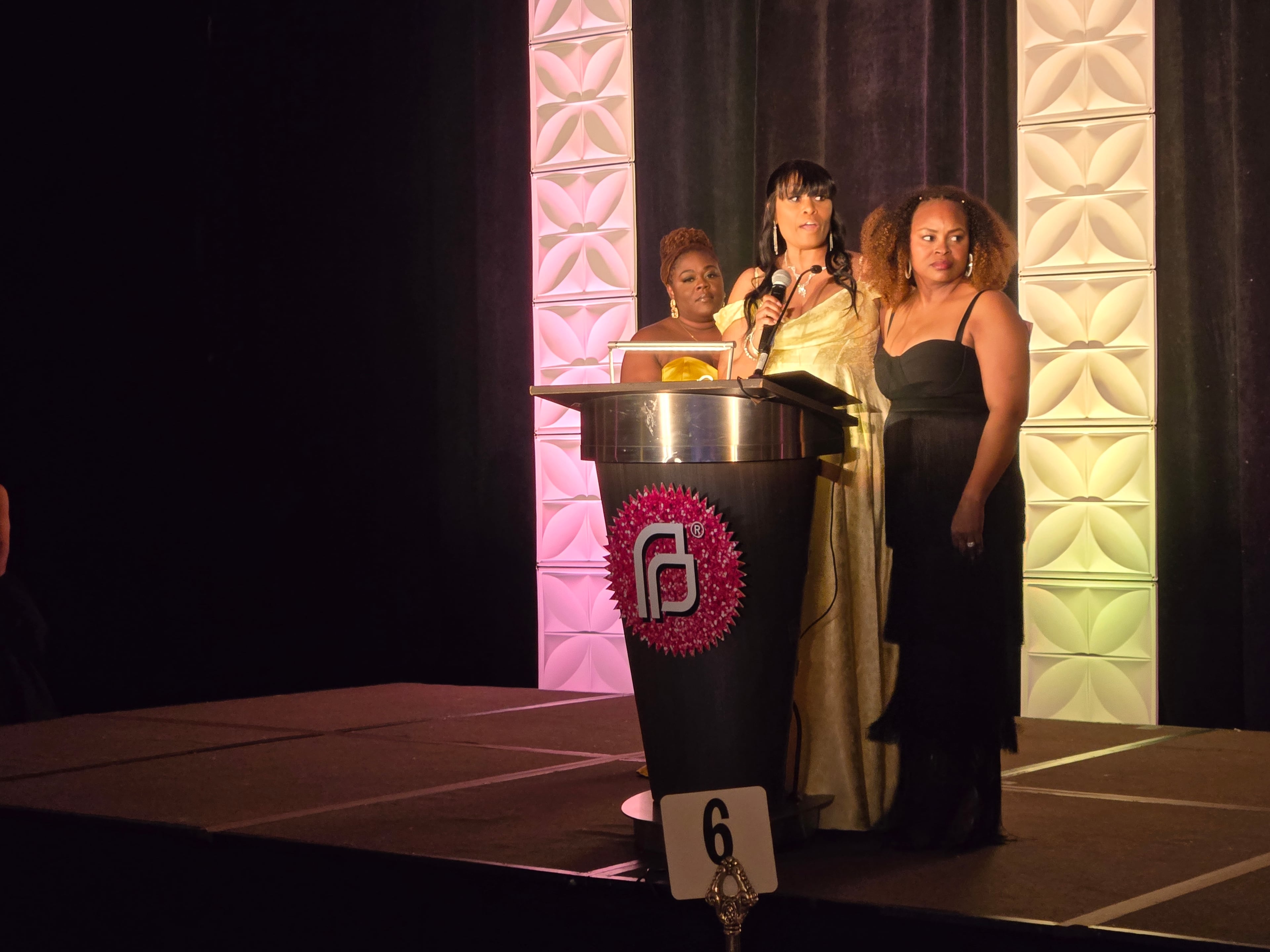 Shanette Williams (center) speaks during a fundraising event for Planned Parenthood Southeast in Buckhead. Williams' daughter, Amber Nicole Thurman, died in 2022 from abortion-related complications. She was joined by Turiya Tomlin-Randall, the older sister of Candi Miller, who also died in 2022 from abortion-related complications. (Maya T. Prabhu/AJC 2025)