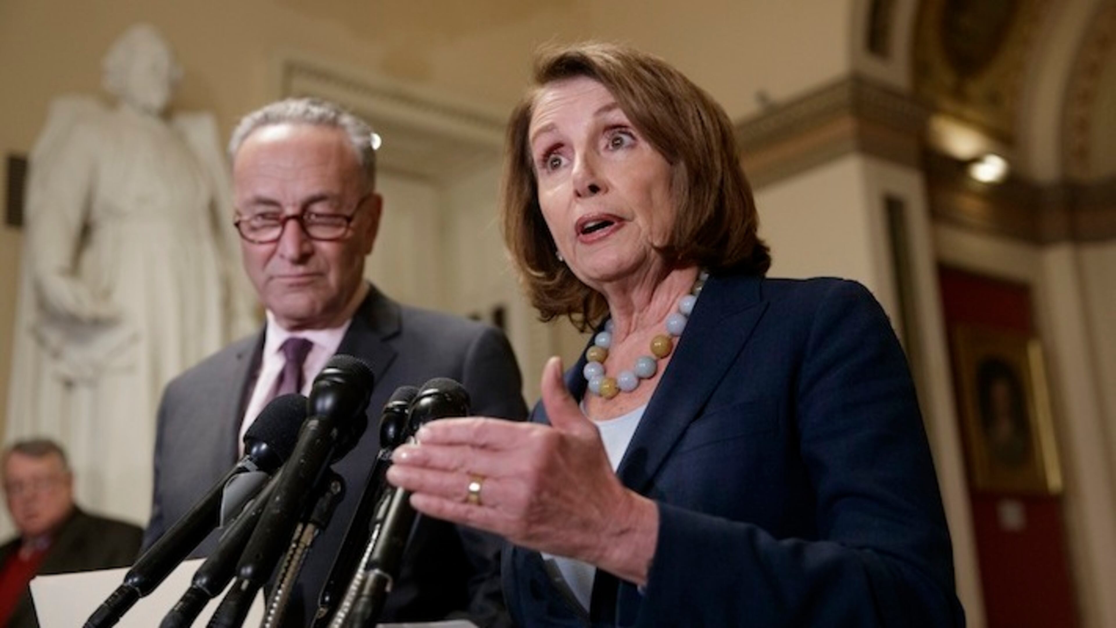 House Democratic Leader Nancy Pelosi of California, and Senate Democratic Leader Chuck Schumer of New York speak to reporters about the Congressional Budget Office projection that 14 million people would lose health coverage under the House Republican bill dismantling former President Barack Obama's health care law, on Capitol Hill in Washington, Monday, March, 13, 2017. (AP Photo/J. Scott Applewhite)