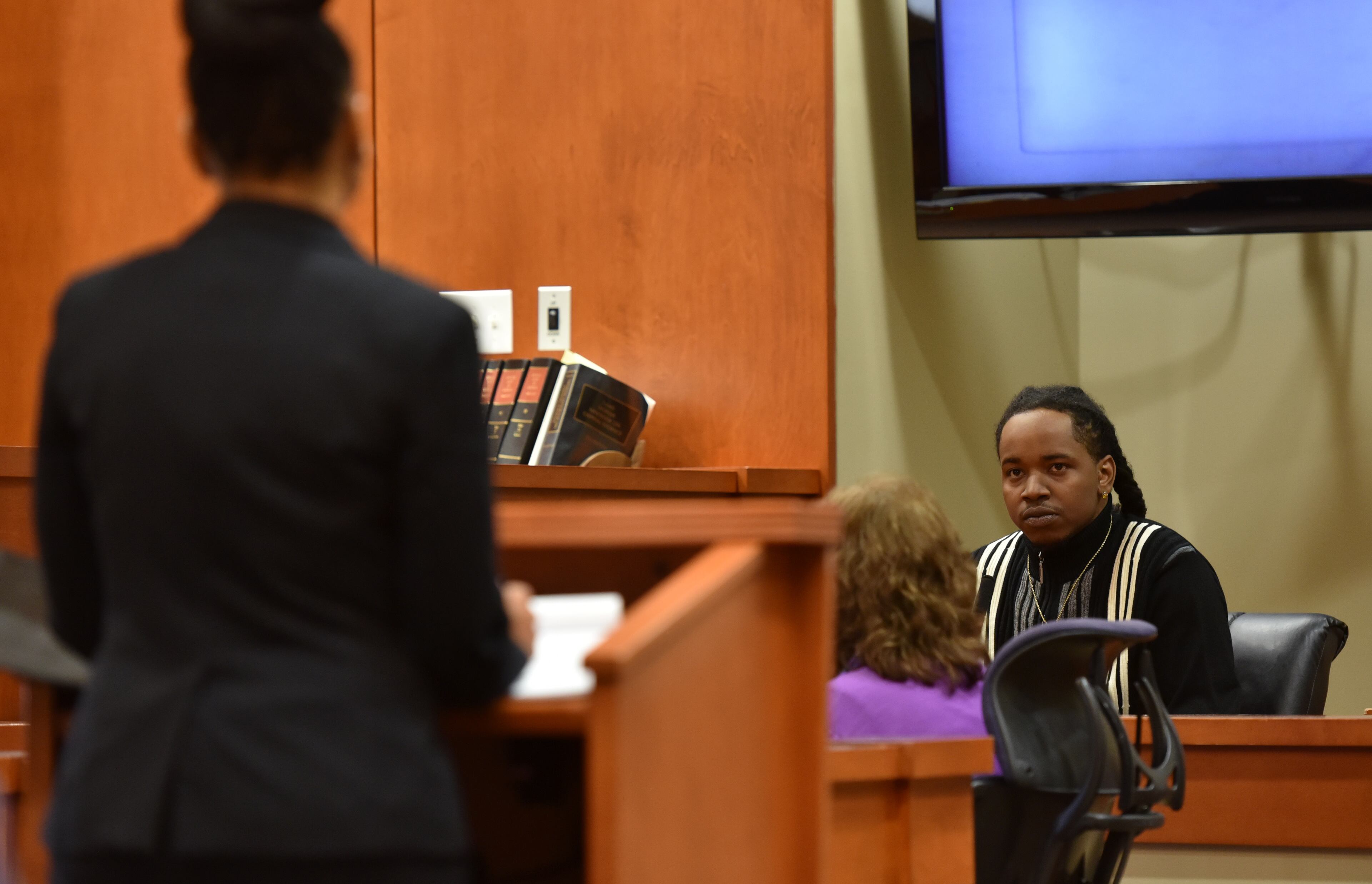 Feb. 18, 2016 Decatur, GA: Prosecutor Buffy Thomas questions her witness, Tavarrius Williams, during the trial of former DeKalb County Police Sgt. Anthony Remone Robinson. Robinson is charged with ordering the beating of Williams after he was arrested on a burglary charge. (UPDATE: On Friday, Feb. 26, Robinson was found guilty on six counts but avoided conviction on the most serious charges.) BRANT SANDERLIN/BSANDERLIN@AJC.COM