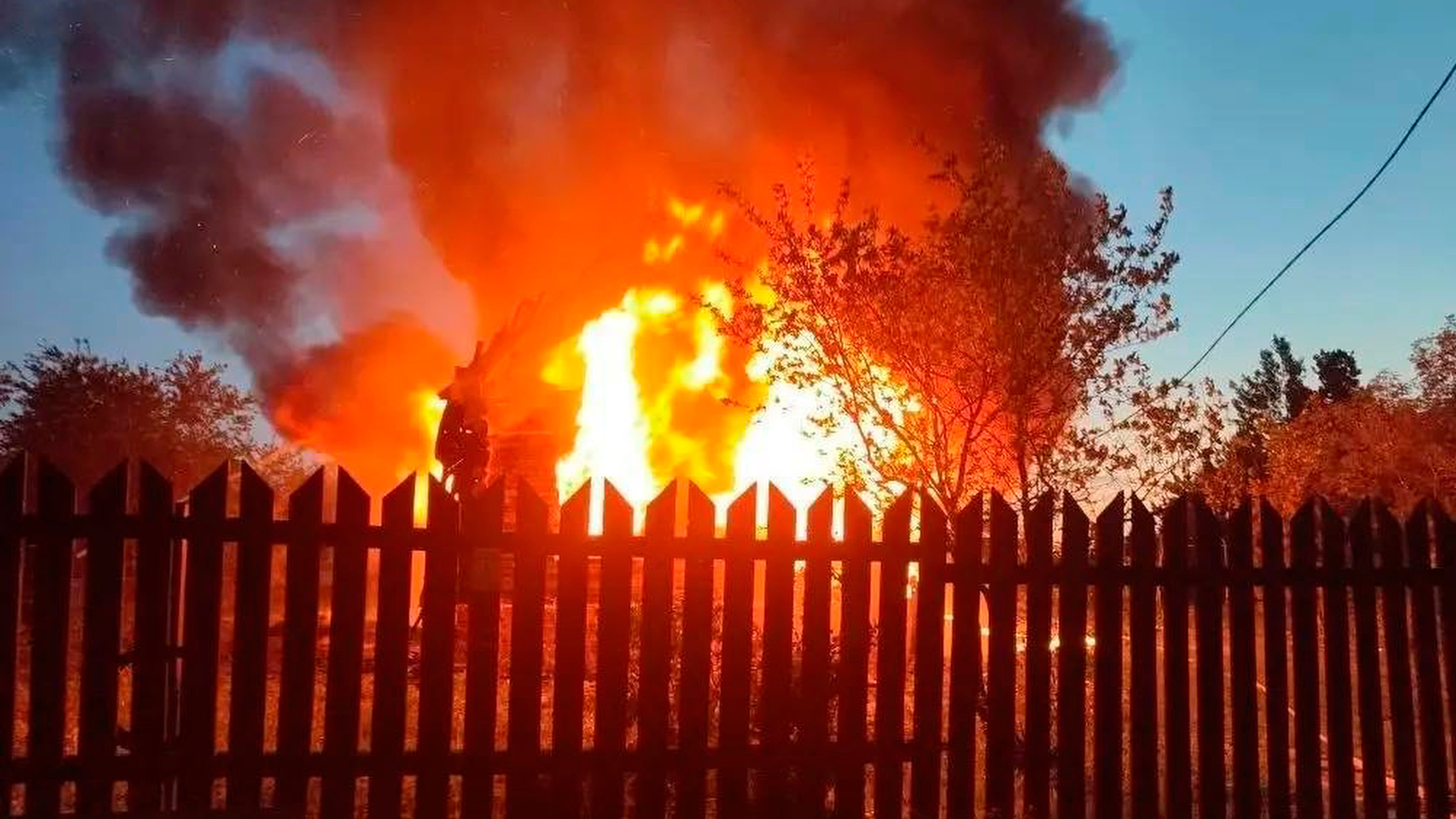 This photo released by Moscow Region Governor Andrei Vorobyev's official telegram channel shows a house on fire after a Ukrainian attack in Khimki, just outside Moscow, Russia, on Sunday, May 17, 2026. (Moscow Region Governor Andrei Vorobyev's official telegram channel via AP)