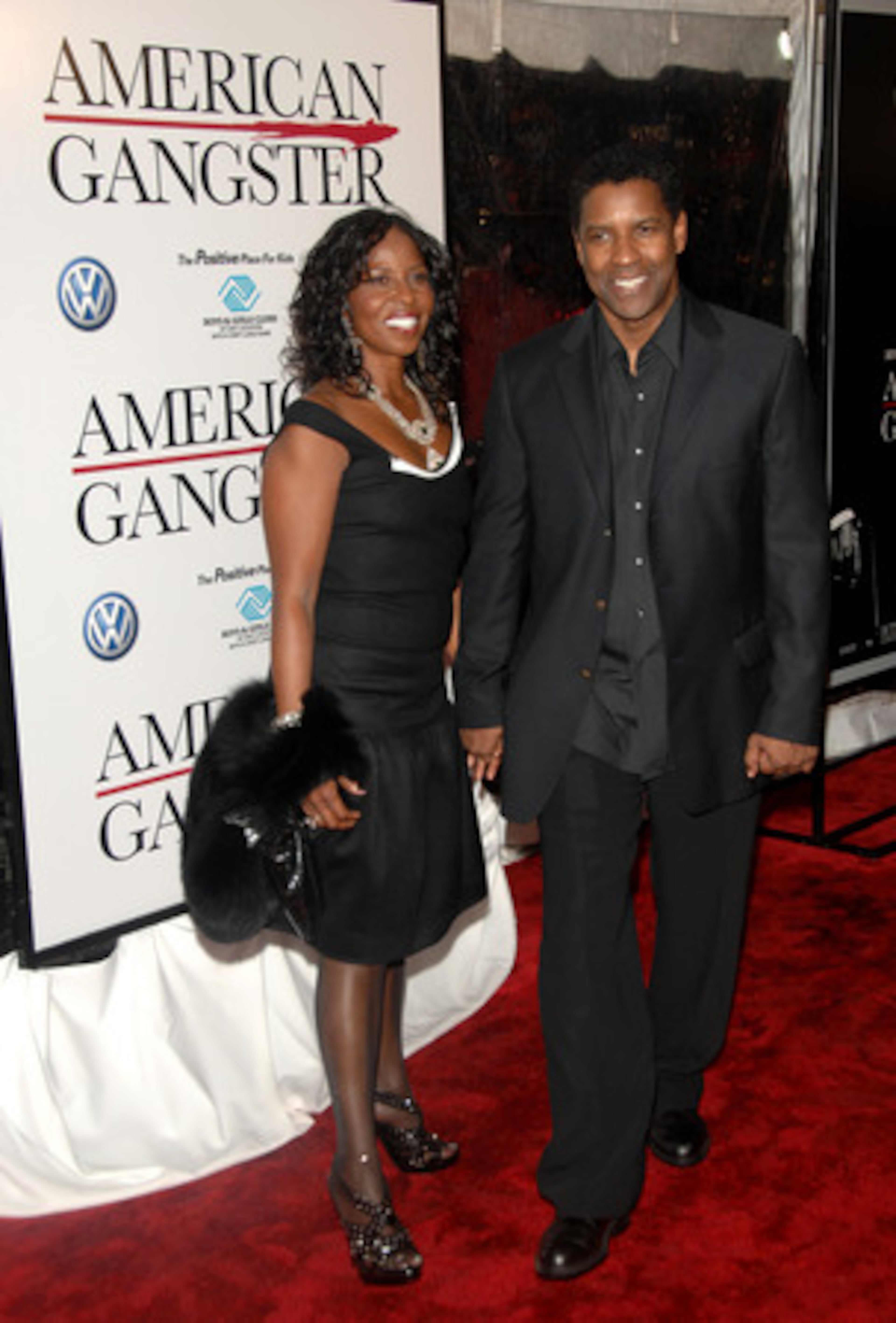 Denzel Washington and his wife, Pauletta, arrive for the premiere of "American Gangster" at the Apollo Theatre in New York. Washington plays a 1970s crime boss in the film.