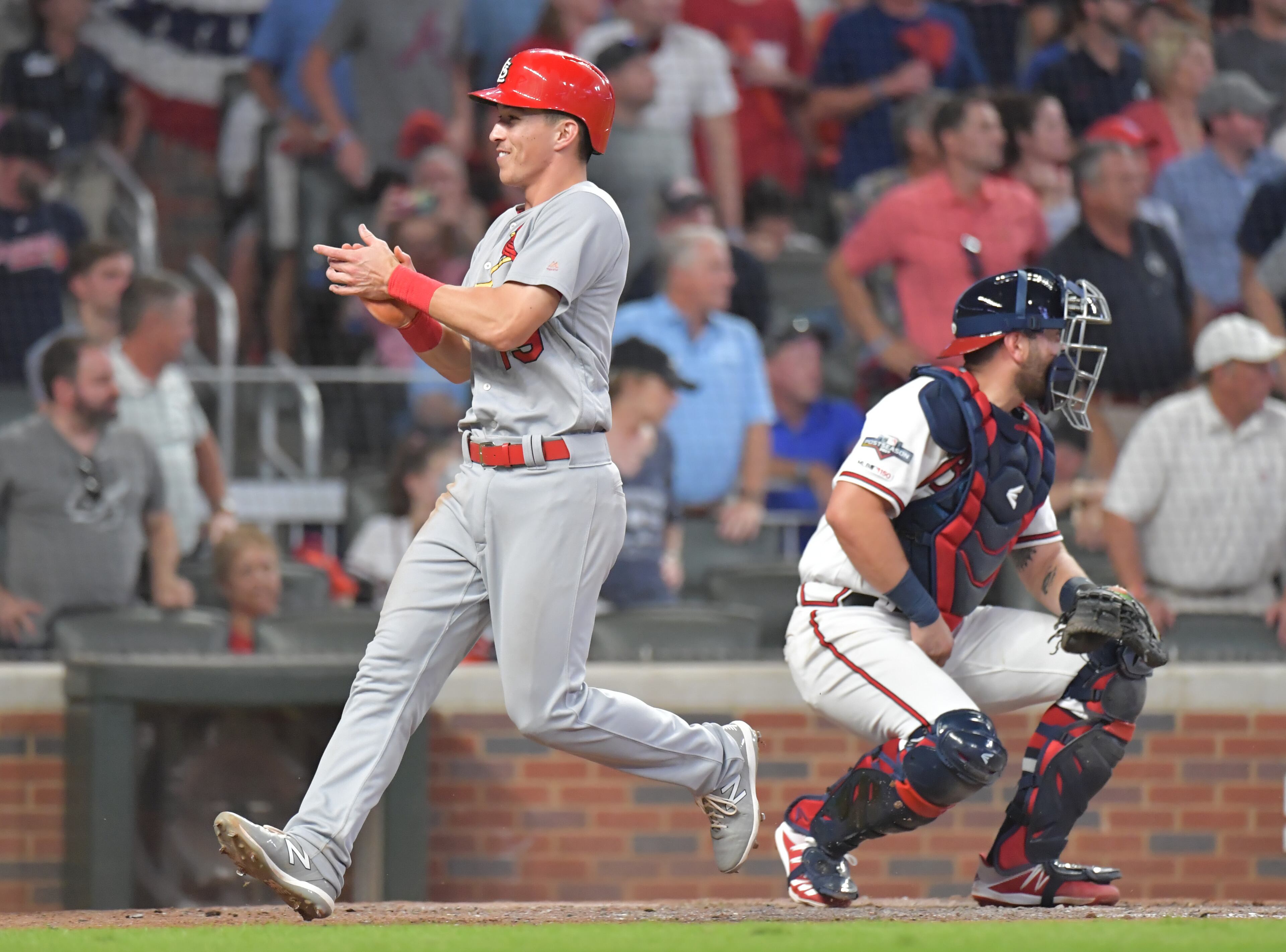 St. Louis Cardinals third baseman Tommy Edman (19) scores. (Hyosub Shin / Hyosub.Shin@ajc.com)
