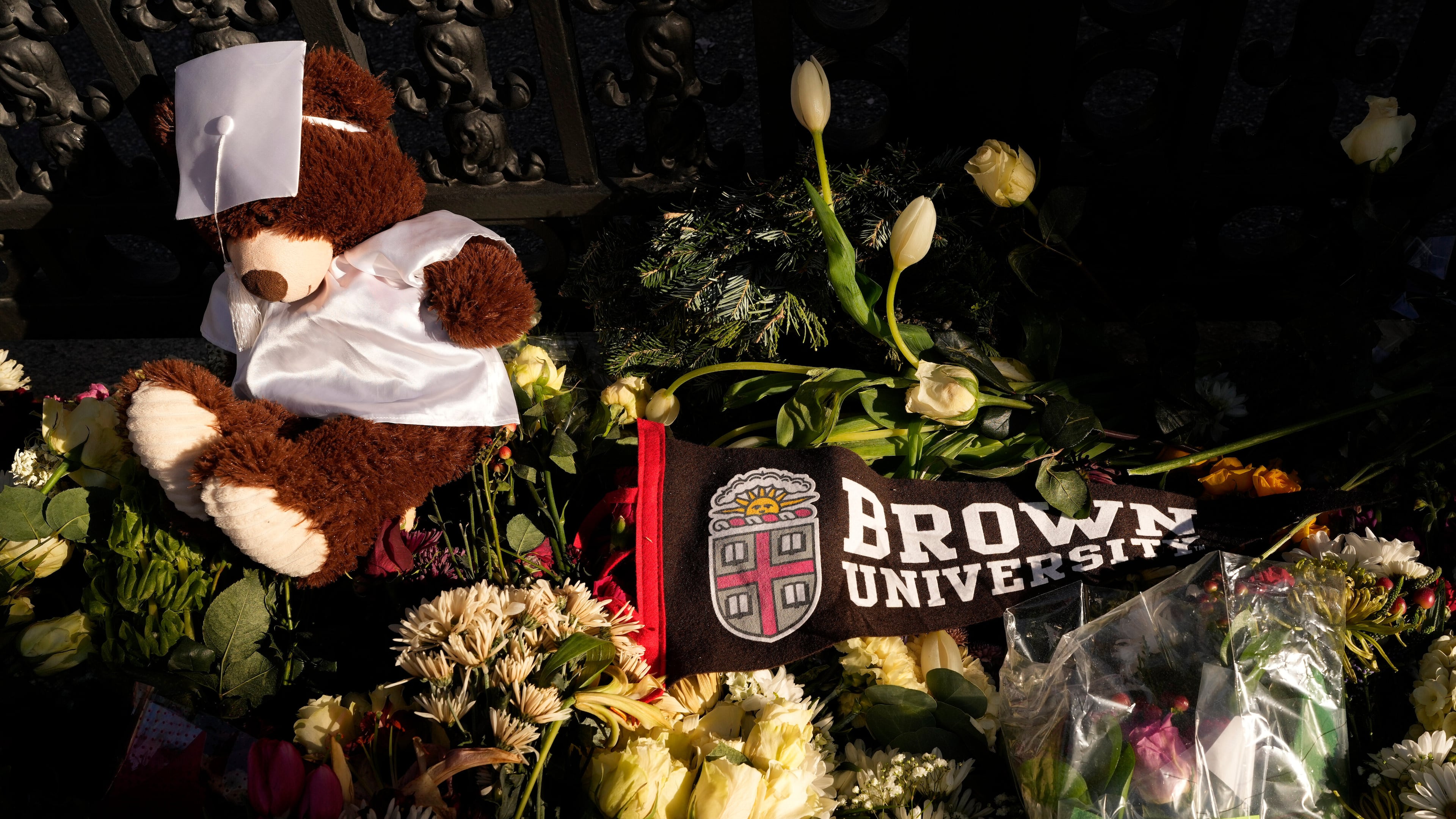A makeshift memorial is seen on the campus of Brown University, close to from the scene of the shooting, Monday, Dec. 15, 2025, in Providence, R.I. (AP Photo/Robert F. Bukaty)