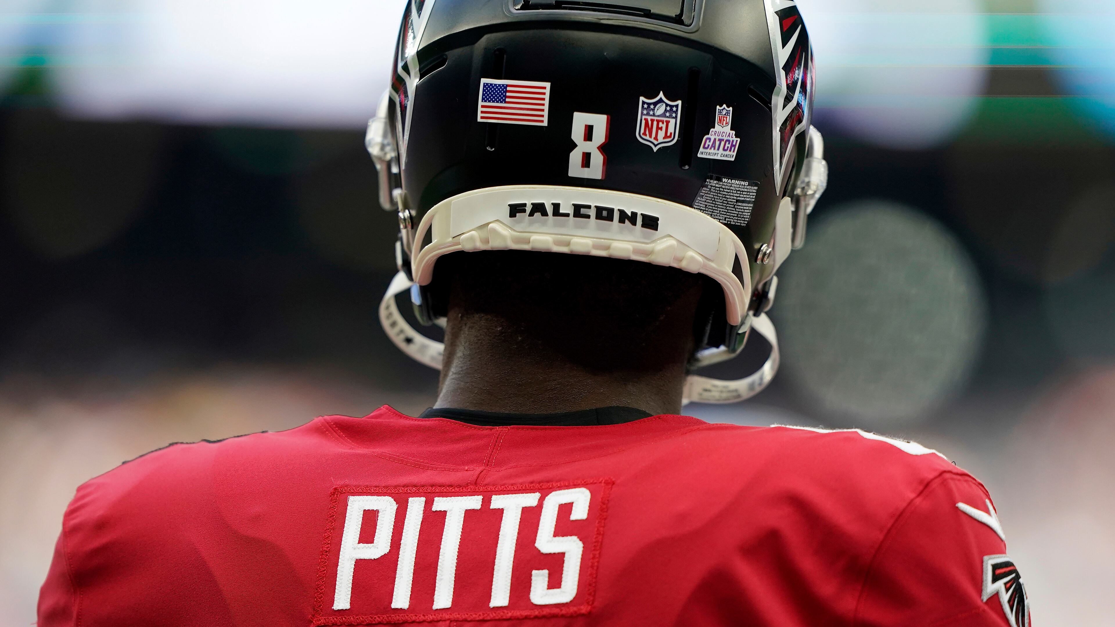 A close up, detail view of the Crucial Catch decal on the helmet of Falcons tight end Kyle Pitts (8) against the New York Jets Sunday, Oct. 10, 2021, at Tottenham Hotspur Stadium in London. (Steve Luciano/AP)
