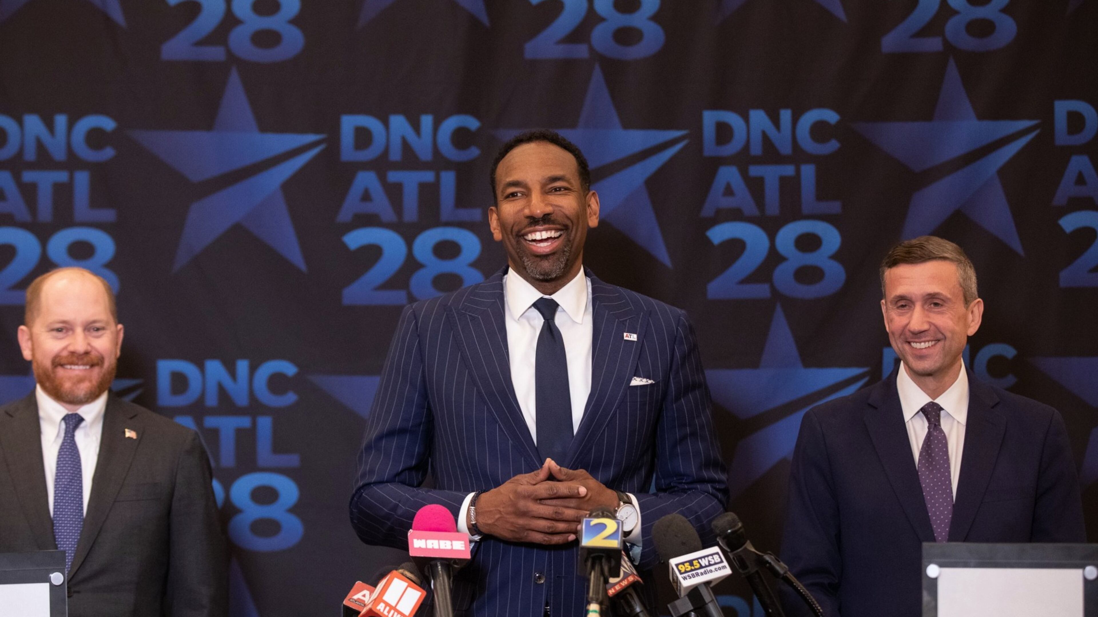 Atlanta Mayor Andre Dickens (center) and Democratic Party of Georgia Chair Charlie Bailey (left) make their case to Democratic National Committee Chair Ken Martin on Thursday, April 23, 2026, as to why the city should host the 2028 Democratic National Convention. (Riley Bunch/AJC)