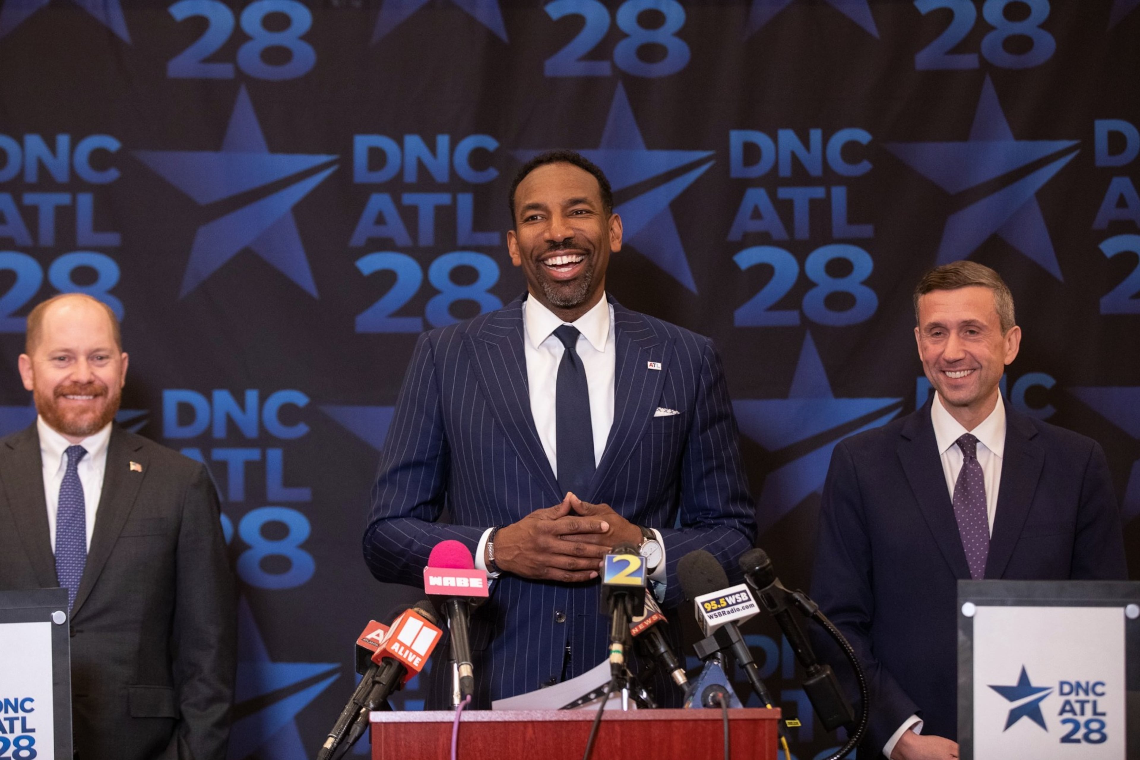 Atlanta Mayor Andre Dickens, center; Democratic Party of Georgia Chair Charlie Bailey, left, and Democratic National Committee Chair Ken Martin, right, seen here in April. (Riley Bunch/AJC)