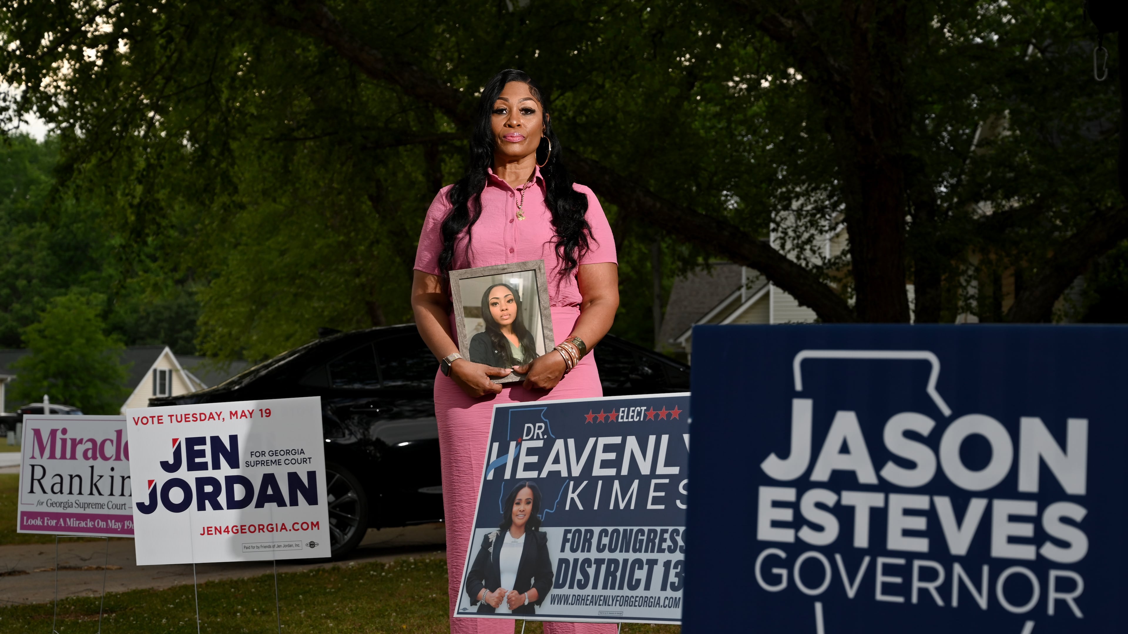 Shanette Williams, whose daughter Amber Thurman died after a delay in emergency medical care tied to Georgia’s abortion ban, poses for a portrait at her home, Wednesday, April 29, 2026, in Covington, Ga. Williams has become involved in political advocacy and is supporting campaigns this cycle. (Hyosub Shin/AJC)