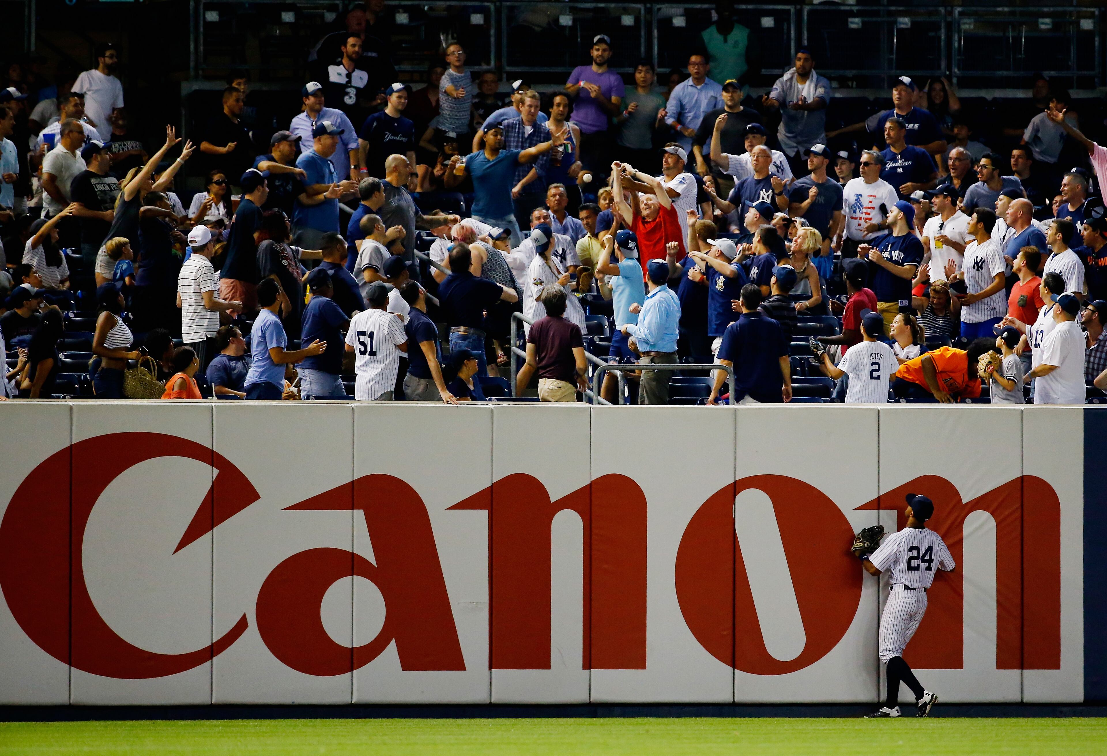 Chris Young of the New York Yankees watches Gattis's home run clear the wall. Gattis had 22 homers last season for the Braves and 21 in his rookie season of 2013. The Astros have 35 more games this season. (Photo by Al Bello/Getty Images) (Photo by Al Bello/Getty Images)